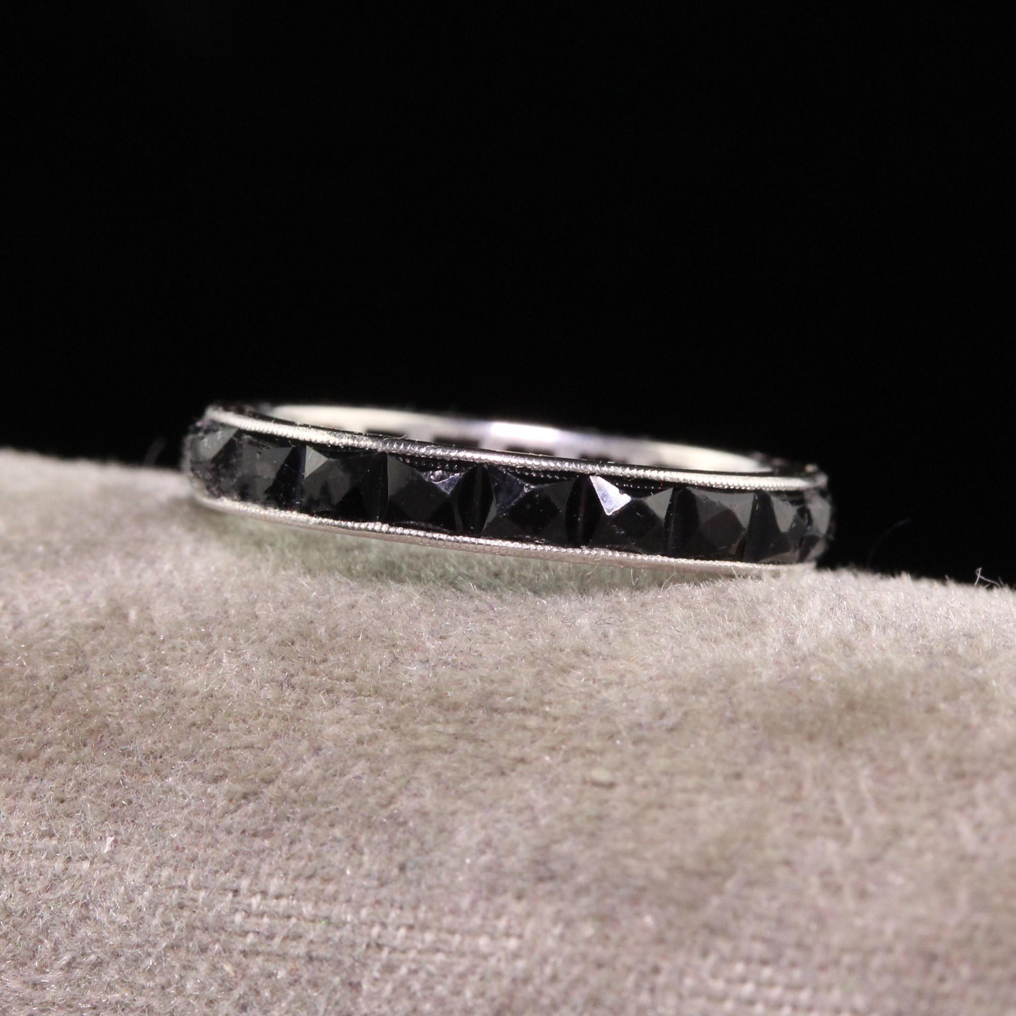 Beautiful Antique Art Deco Platinum French Cut Onyx Eternity Band - Size 4 3/4. This incredible eternity band is crafted in platinum. The ring has chunky french cut onyx set around the entire band. Some of the bands have slight abrasions or chips