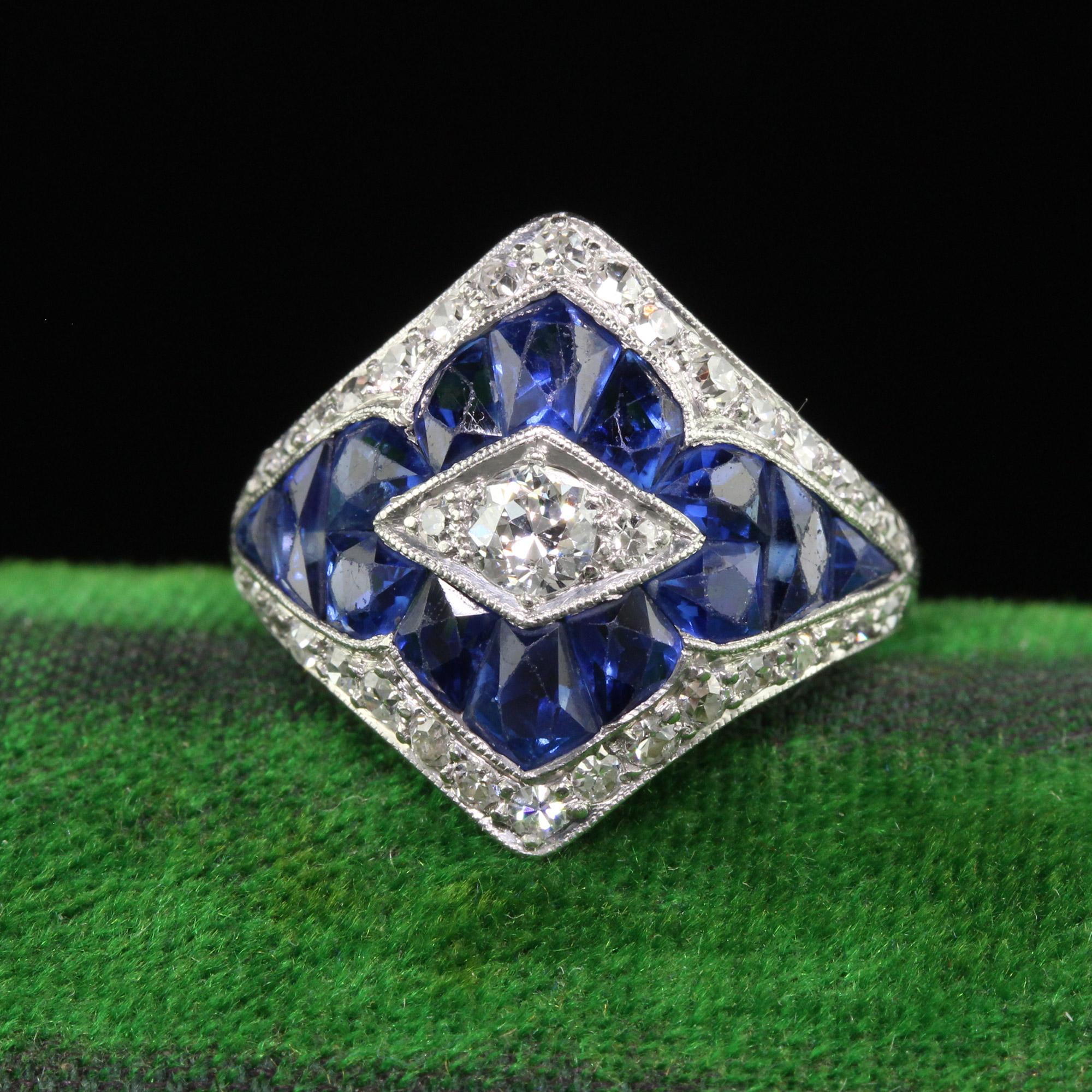 Beautiful Antique Art Deco Platinum French Cut Sapphire Old Euro Diamond Ring. This incredible Art Deco sapphire and diamond ring is crafted in platinum. The top of the ring has gorgeous old European cut and French cut sapphires set in a beautiful