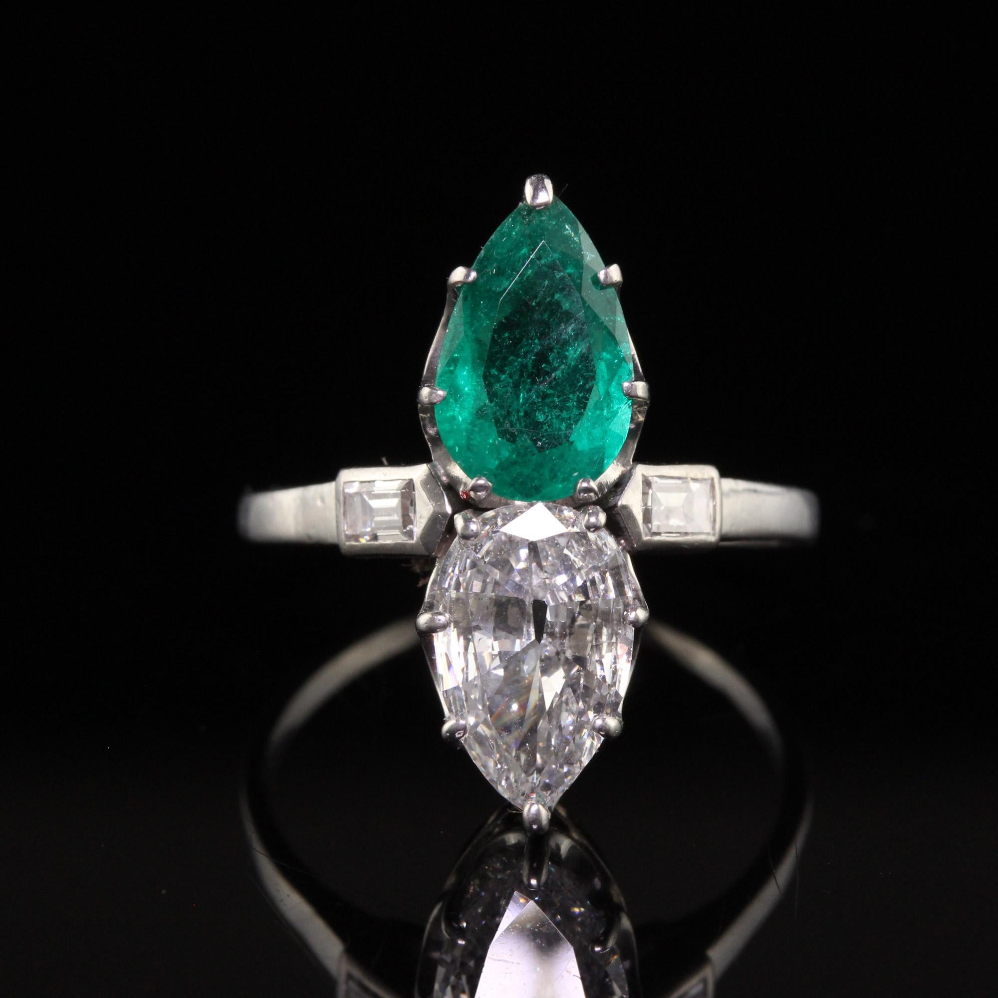 Antique Art Deco Platinum French Pear Diamond Emerald Toi Et Moi Engagement Ring In Good Condition For Sale In Great Neck, NY