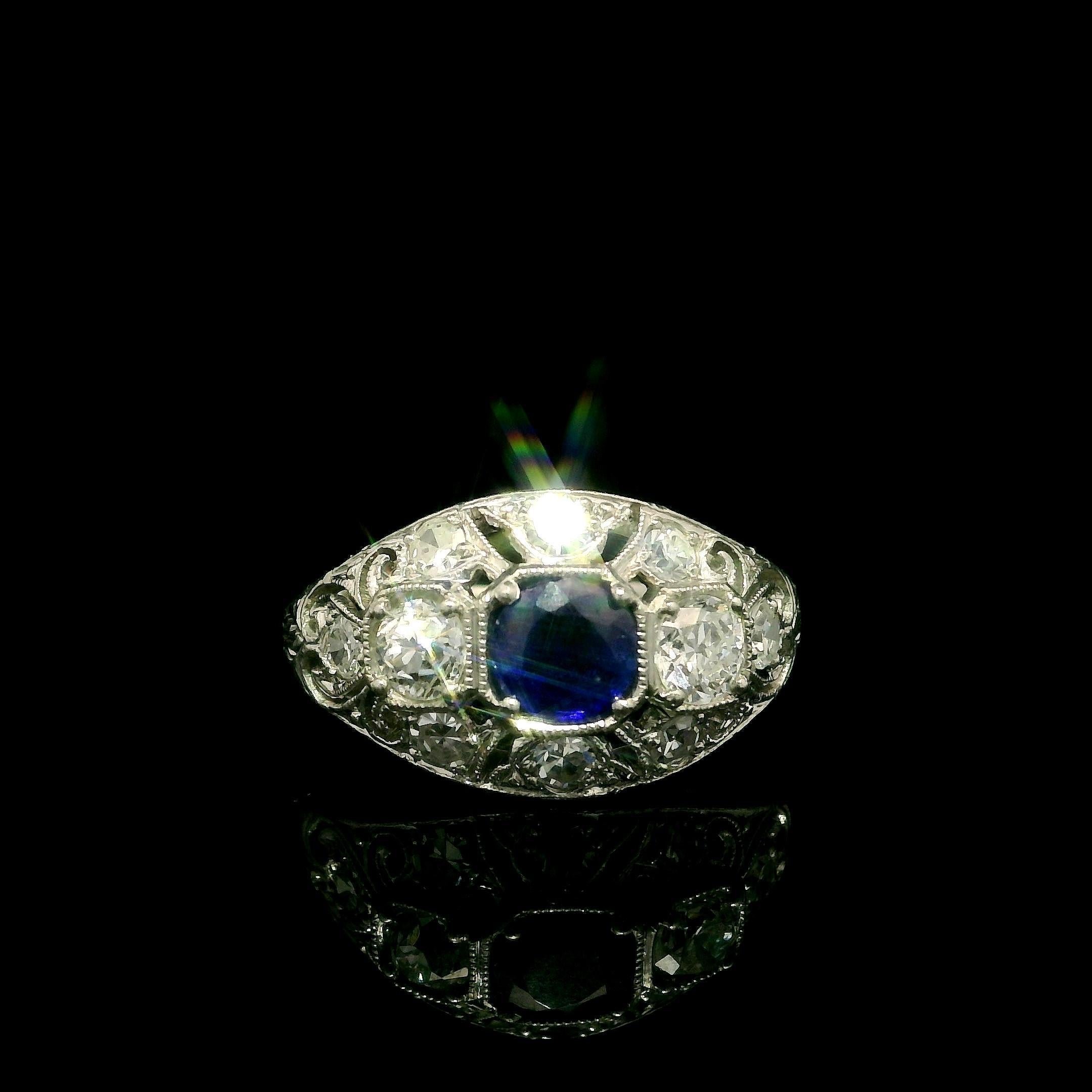 --Stone(s):--
(1) Natural Genuine Sapphire - Round Step Cut - Prong Set - Gorgeous Royal Blue Color - No Heat - Burma - 0.45ct (exact)
** See Certification Details Below for Complete Info **
Numerous Natural Genuine Diamonds - 8 Single Cut w/ 2 Old