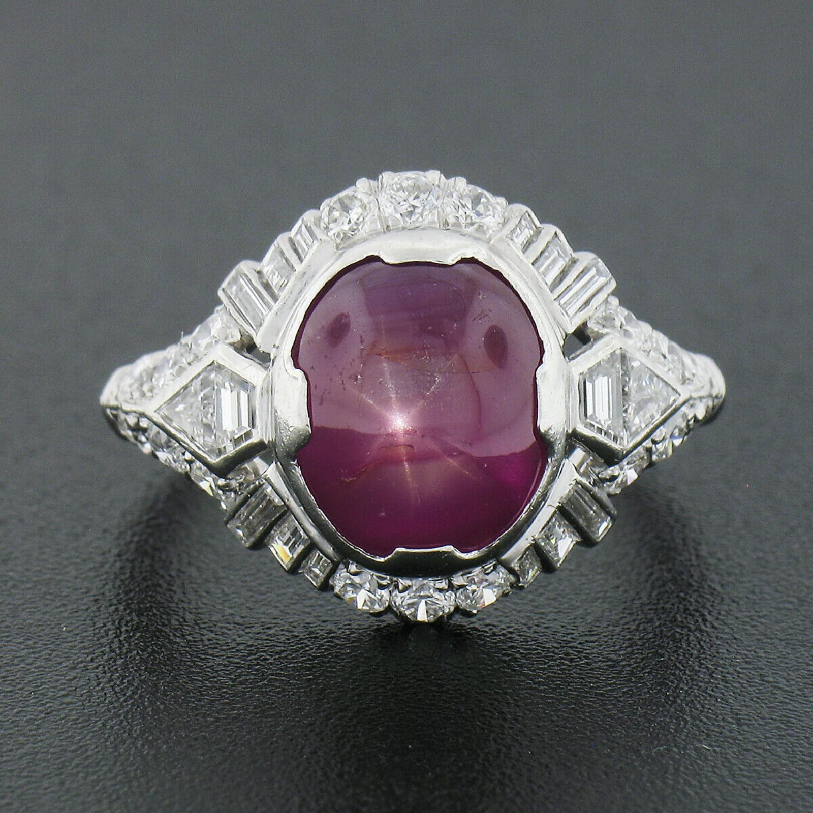 Here we have a stunning antique ring that was crafted from solid 900 platinum during the art deco period. It features a GIA certified natural star ruby stone that exhibits a gorgeous purplish-red color and a well-centered six-ray star. The ruby