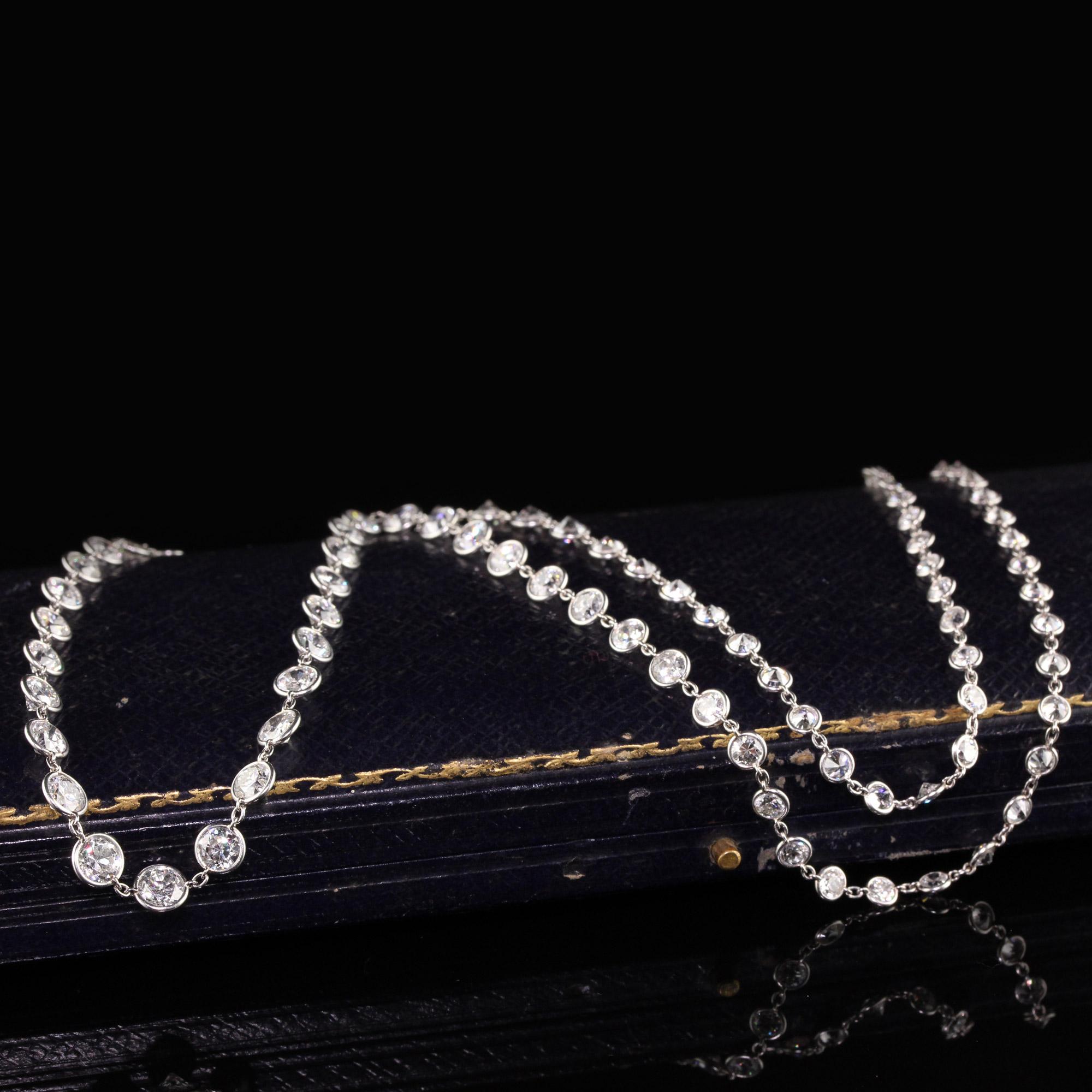 Gorgeous Antique Art Deco Platinum Graduated Old European Diamonds by the Yard Necklace. This beautiful and breathtaking necklace chain is 24 inches of graduated old european cut diamonds. The diamonds start at .15 cts and go up to .60 ct old