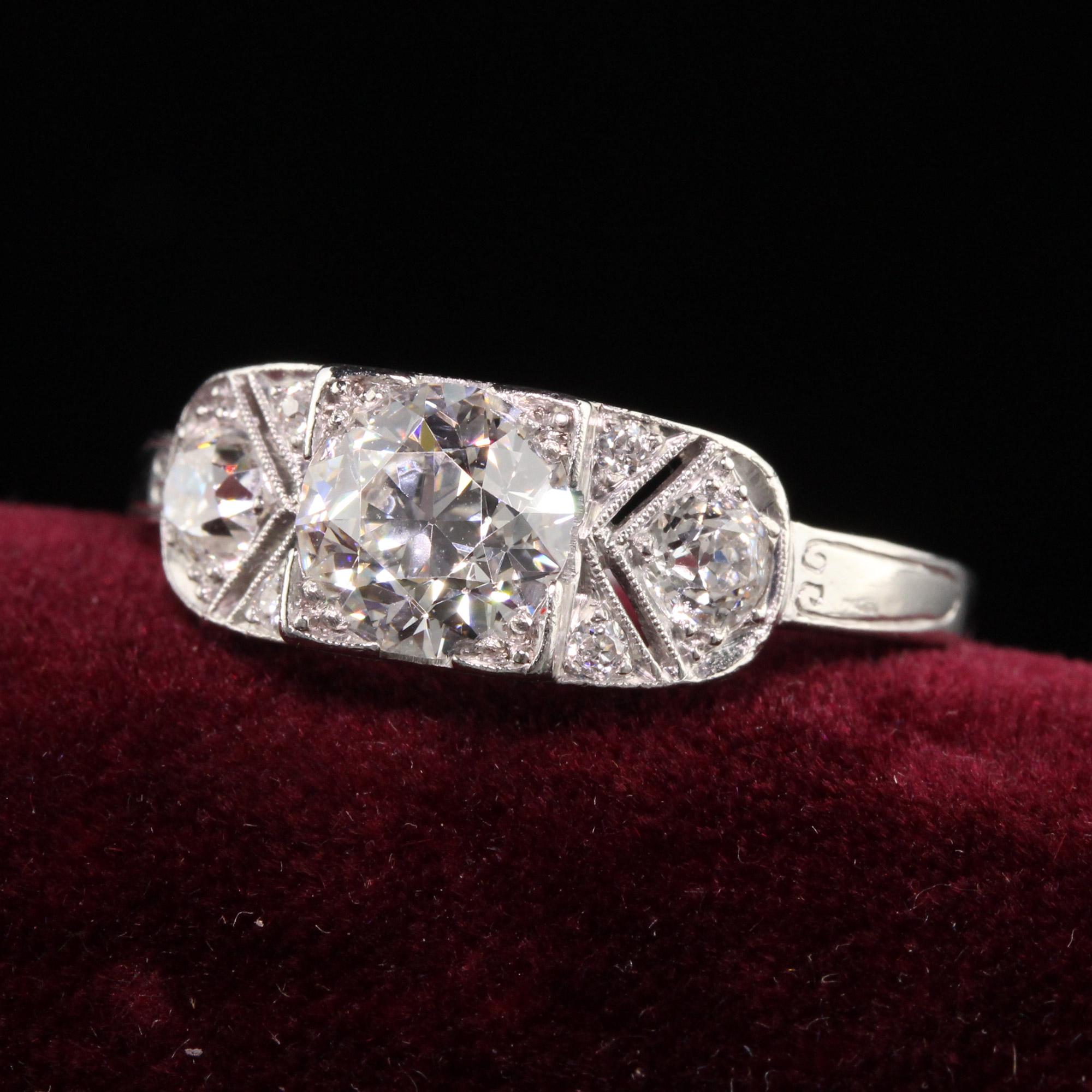 Beautiful Antique Art Deco Platinum Hall Co Old European Diamond Engagement Ring. This beautiful engagement ring is crafted in platinum. The ring is in incredible condition with fine old European cut diamonds and gallery work.

Item #R1254

Metal: