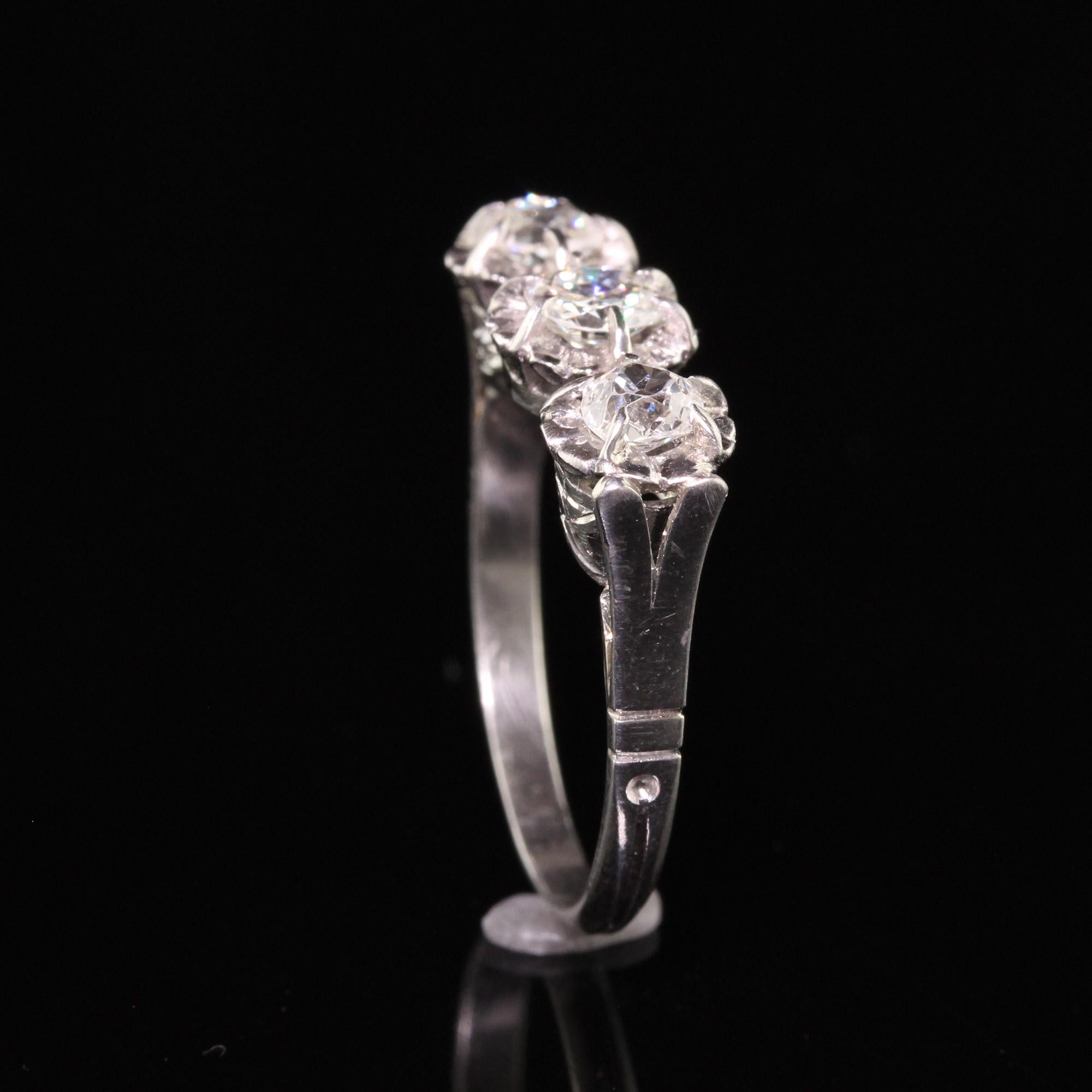 Women's Antique Art Deco Platinum Hallmarked Old Mine Diamond Three Stone Ring For Sale