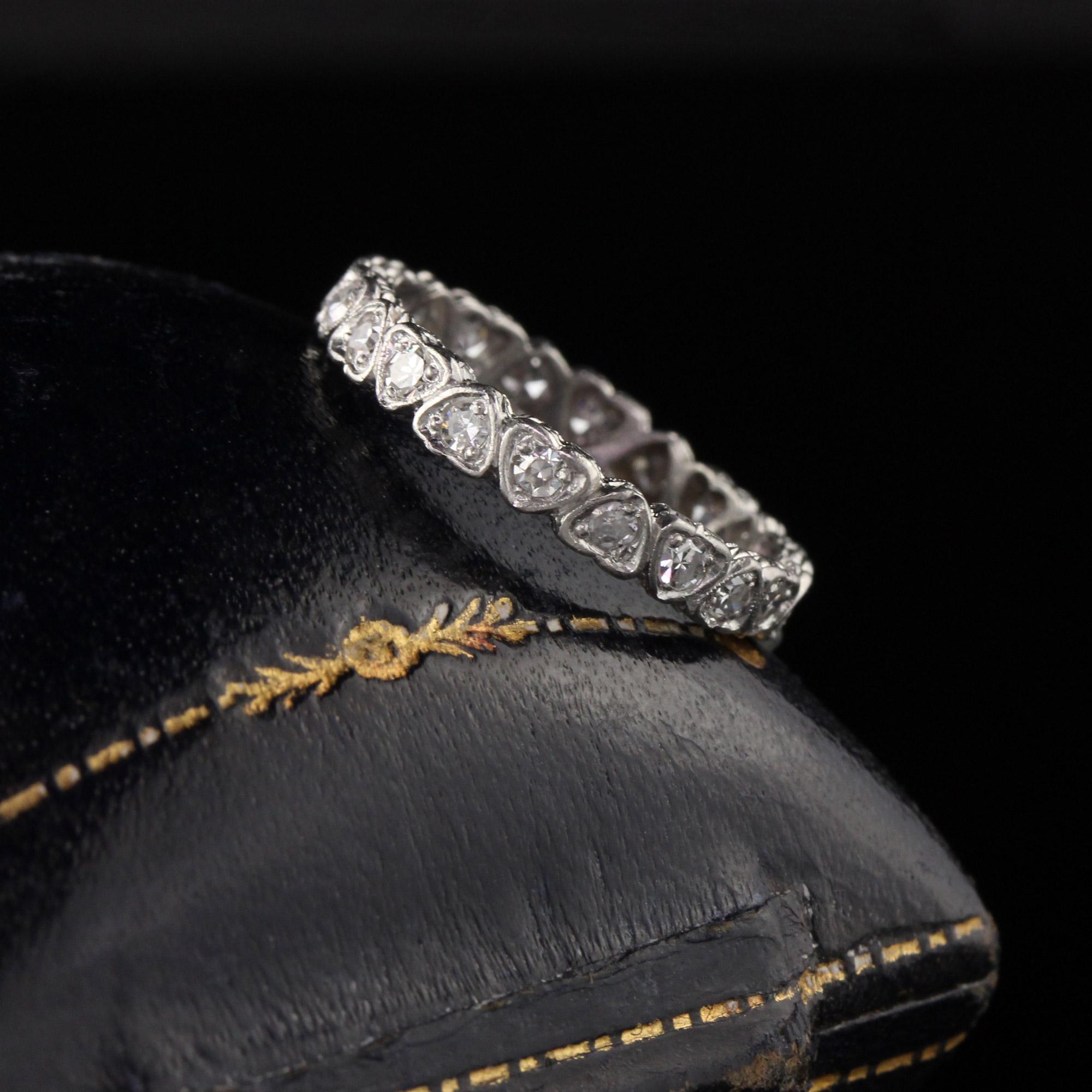 Gorgeous diamond eternity band with heart shape diamonds. 

#R0421

Metal: Platinum

Weight: 2.8 Grams

Total Diamond Weight - Approximately 0.50 CTS

Diamond Color - H

Diamond Clarity - VS2 - SI1

Ring Size: 5 1/4

*Unfortunately this ring cannot
