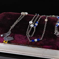 Antique Art Deco Platinum Lapis Pearl and Enamel Stork Pendant Necklace