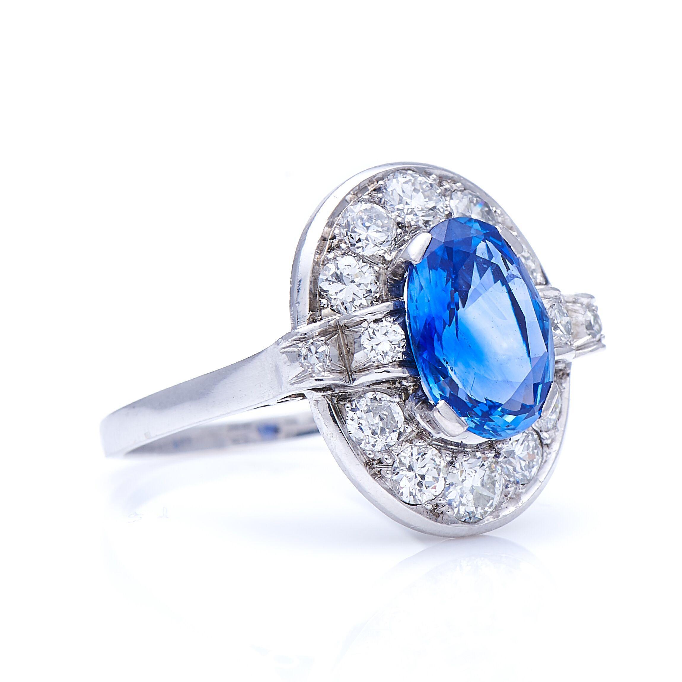Sapphire and diamond ring, 1920s. This ring centres on a gorgeous oval sapphire weighing 2.64 carats, of a mid violet-blue known as ‘Cornflower’, strongly associated with sapphires from Sri Lanka (Ceylon). In addition to its characteristic colour,