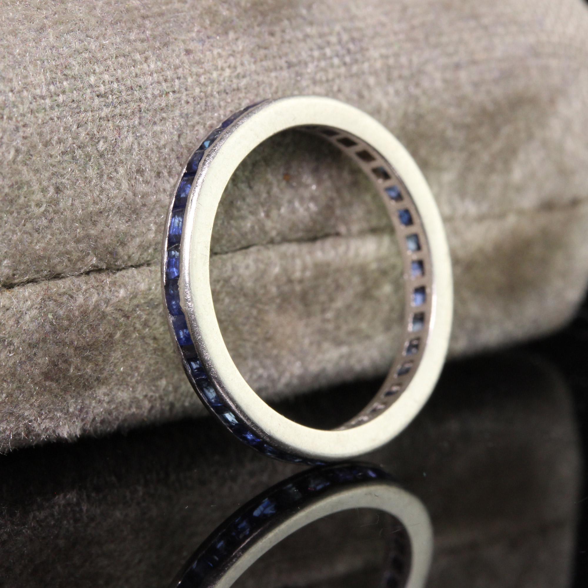 Beautiful Antique Art Deco Platinum Natural Sapphire Square Cut Eternity Band. This classic eternity band is crafted in platinum. The ring has natural sapphires going around the entire ring and sits low on the finger. The sapphires have light