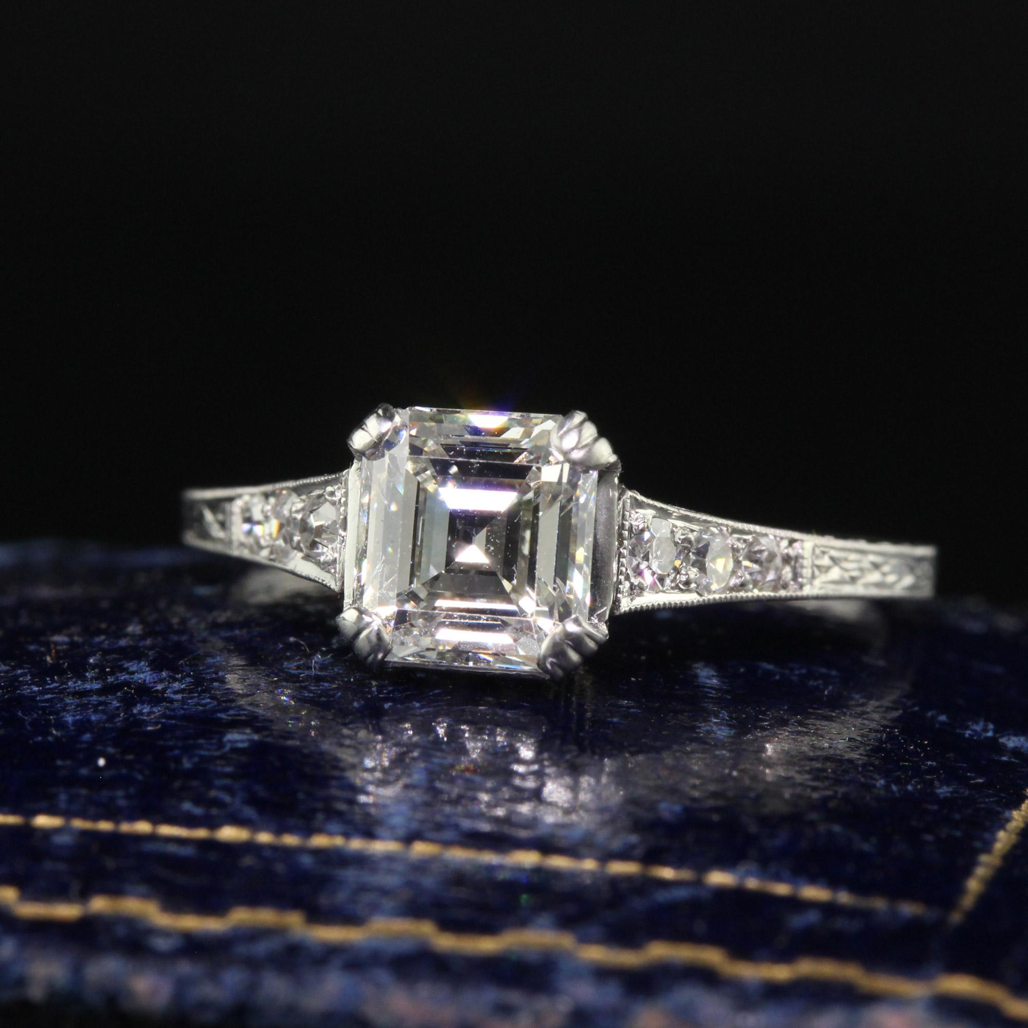 Beautiful Antique Art Deco Platinum Old Asscher Cut Diamond Filigree Engagement Ring - GIA. This incredible engagement ring is crafted in platinum. The center holds a beautiful white old asscher cut diamond and it is set in a beautiful Art Deco