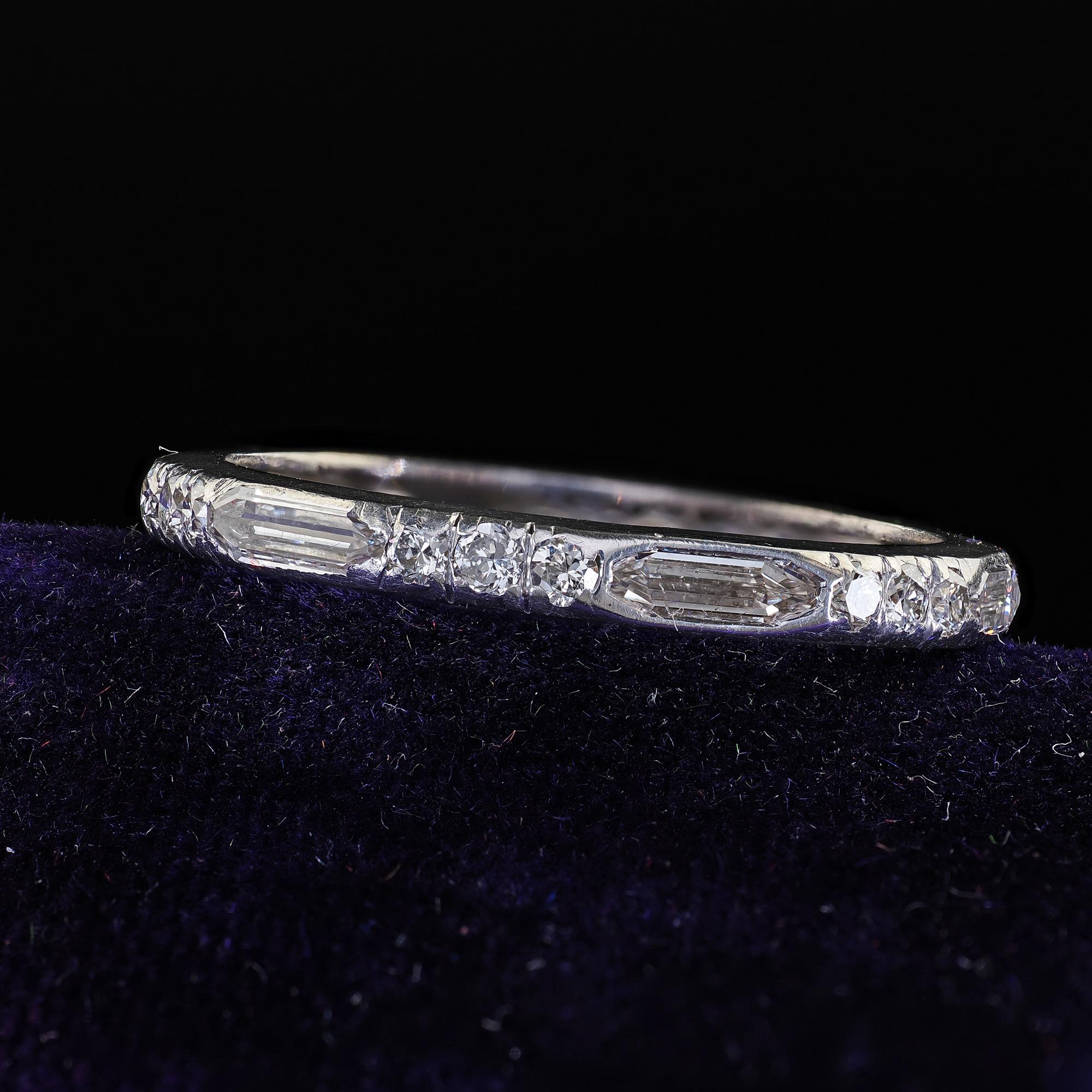 Beautiful Antique Art Deco Platinum Old Bullet Cut Diamond Eternity Wedding Band. This beautiful Art Deco bullet cut diamond wedding band is crafted in platinum. This gorgeous ring features old bullet cut diamonds set with old European cut diamonds