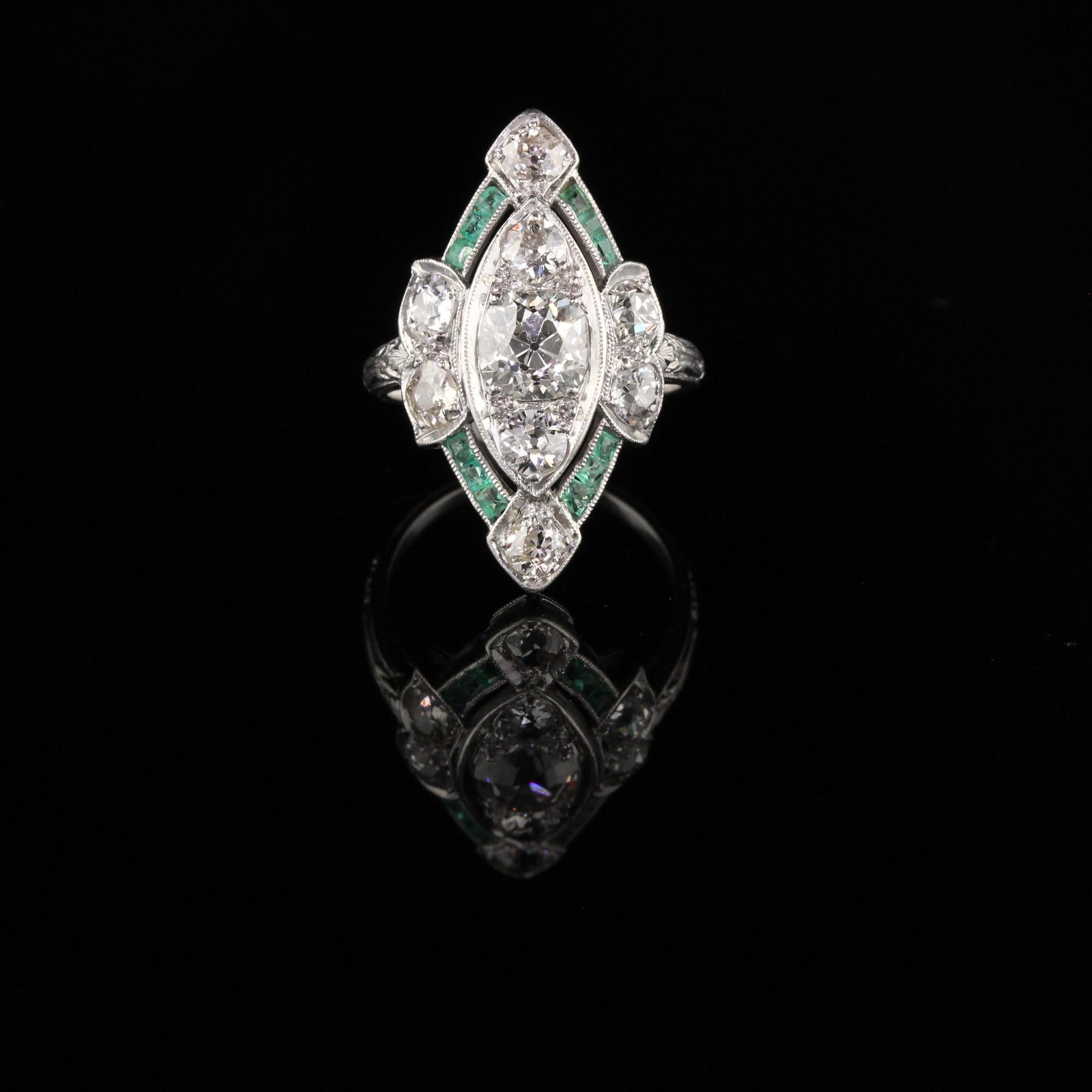 Antique Art Deco Platinum Old Cushion Cut Diamond and Emerald Shield Ring In Good Condition In Great Neck, NY