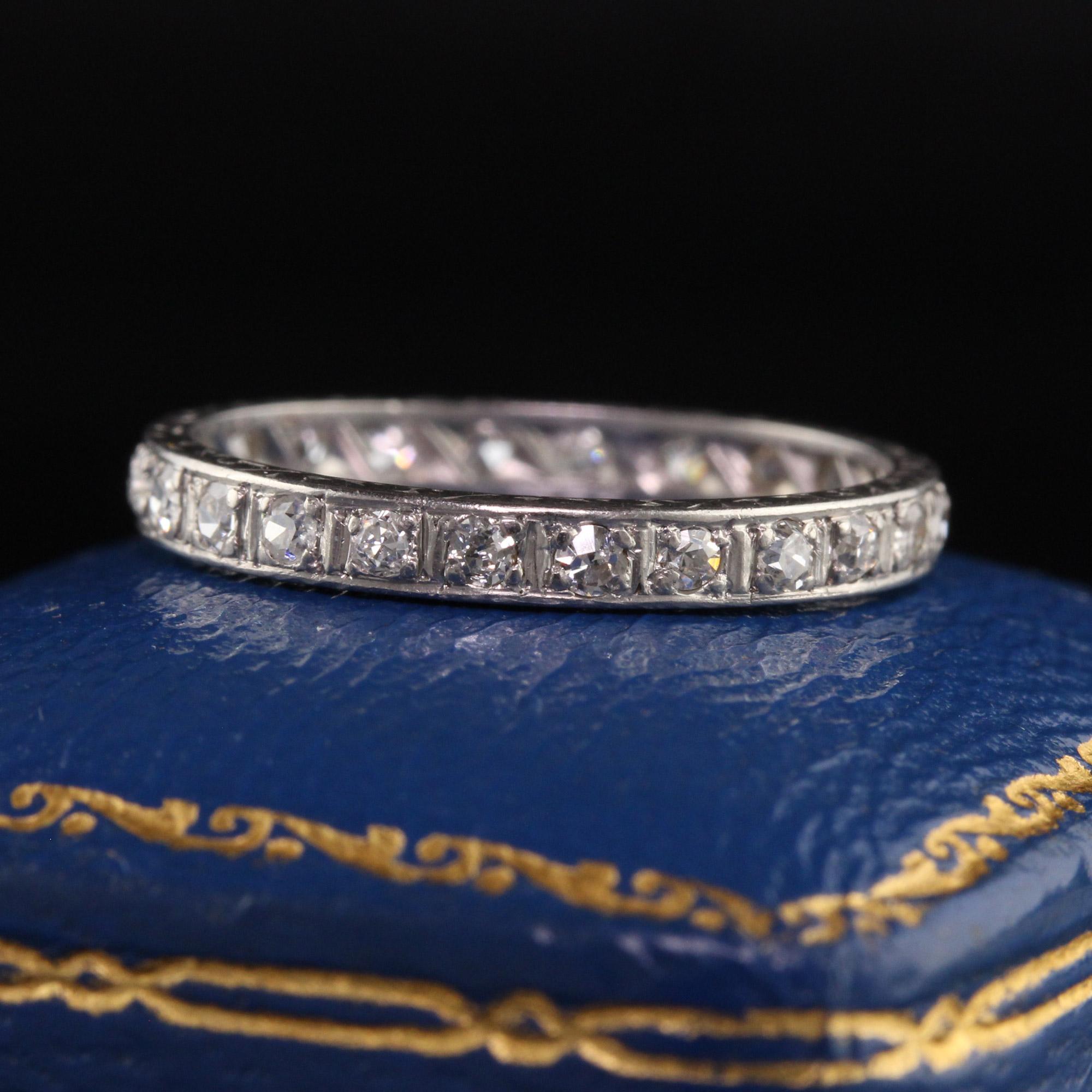 Beautiful Antique Art Deco Platinum Old Cut Diamond Engraved Eternity Band. This gorgeous wedding band is crafted in platinum. It has old cut diamonds going around the entire ring and the sides are engraved.

Item #R1252

Metal: Platinum

Weight: