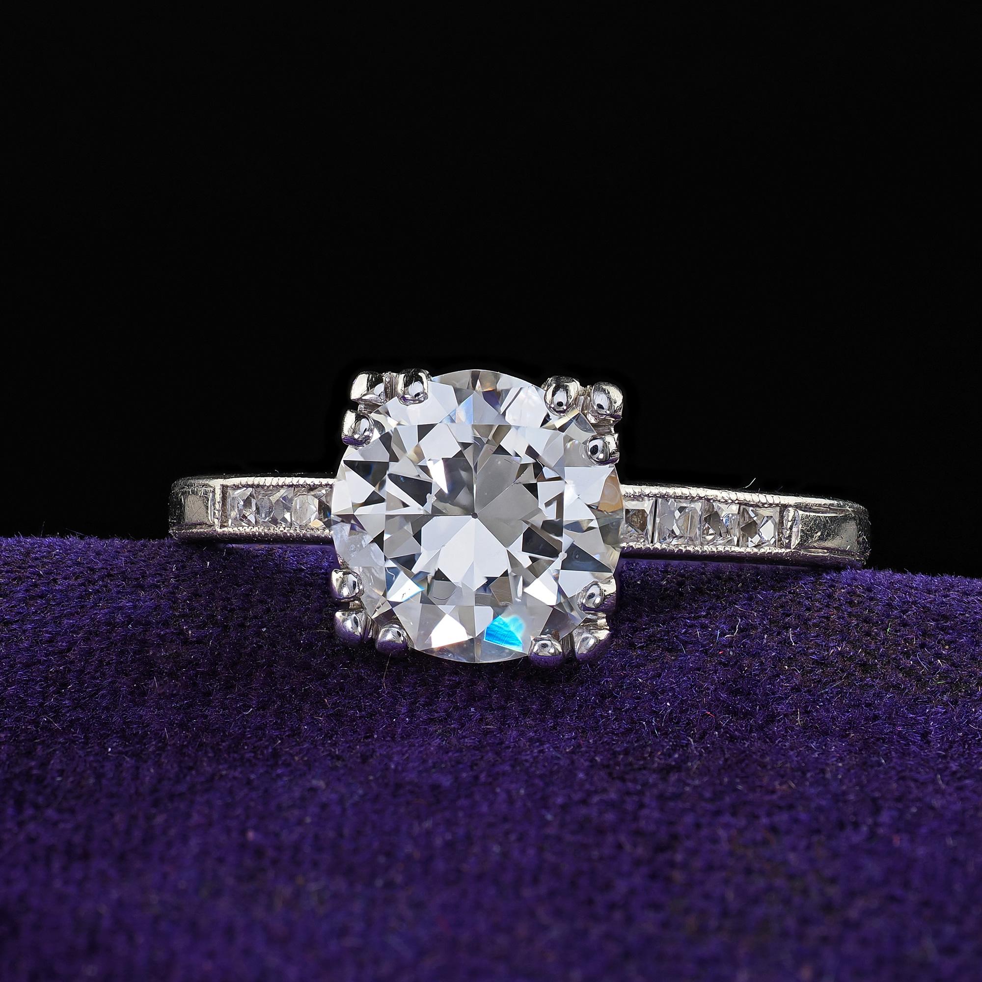 Beautiful Antique Art Deco Platinum Old Cut Diamond French Cut Engagement Ring - GIA. This incredible antique engagement ring is crafted in platinum. This ring features a beautiful white diamond in the center that has a GIA report. The ring has