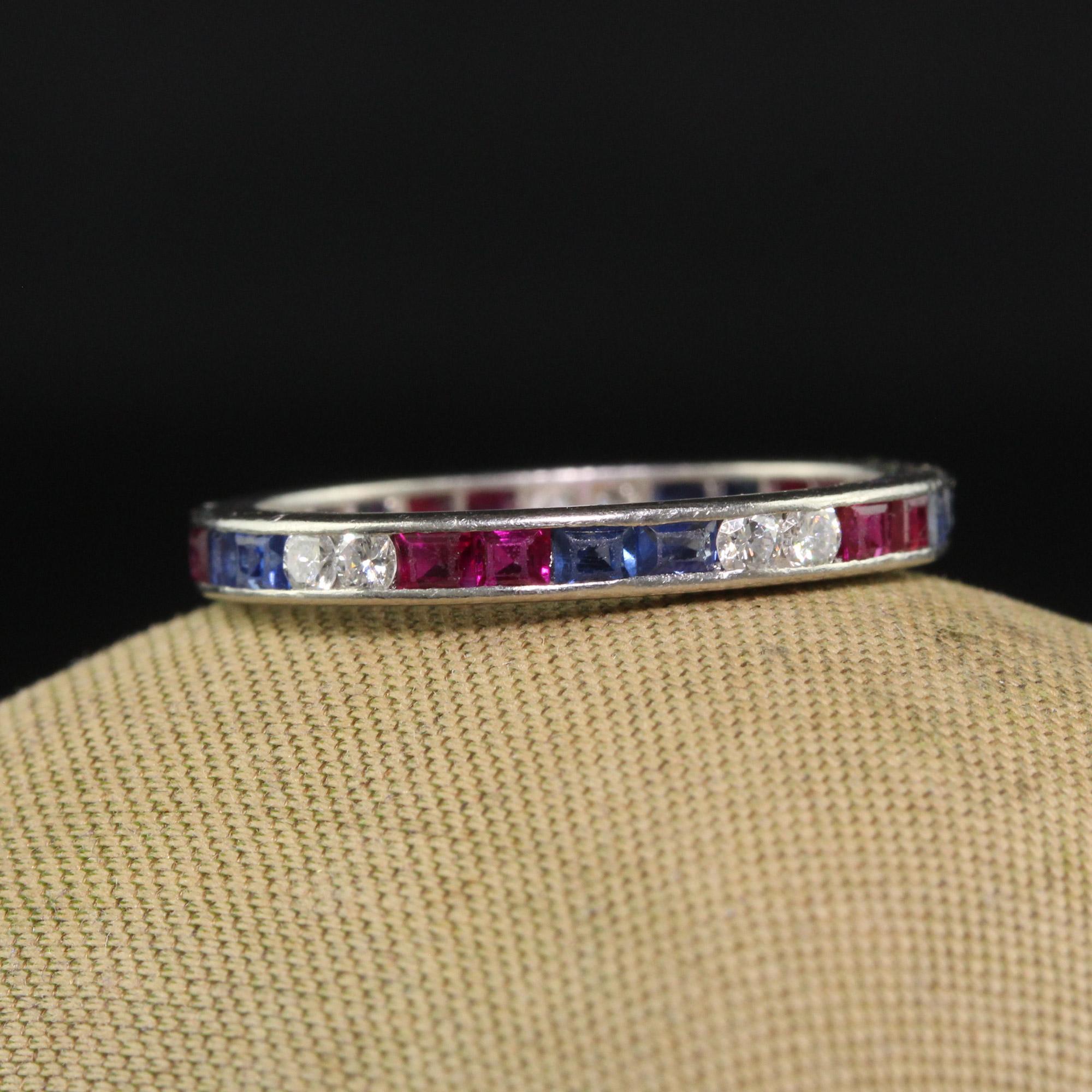 Women's Antique Art Deco Platinum Old Cut Diamond Ruby and Sapphire Eternity Band For Sale
