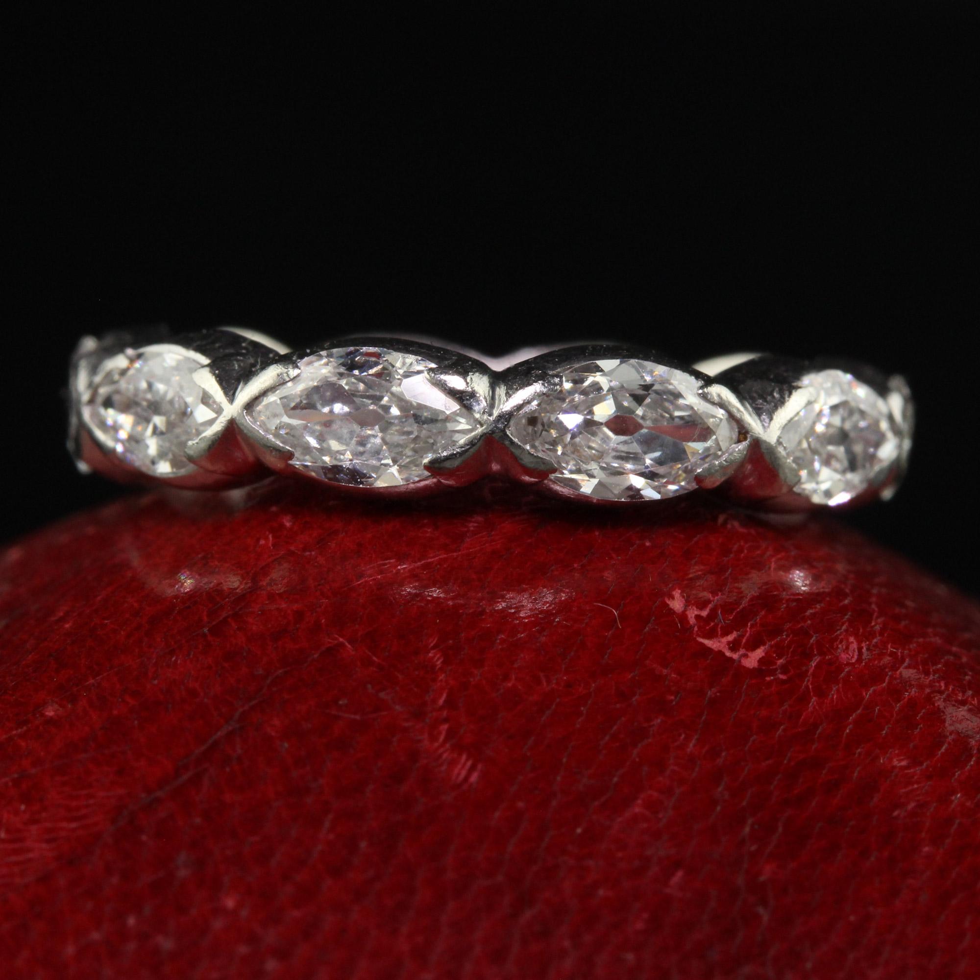 Beautiful Antique Art Deco Platinum Old Cut Marquise Diamond Eternity Wedding Band. This incredible old cut marquise diamond wedding band is crafted in platinum. The ring has large old cut marquise set around the entire ring. The ring has a very