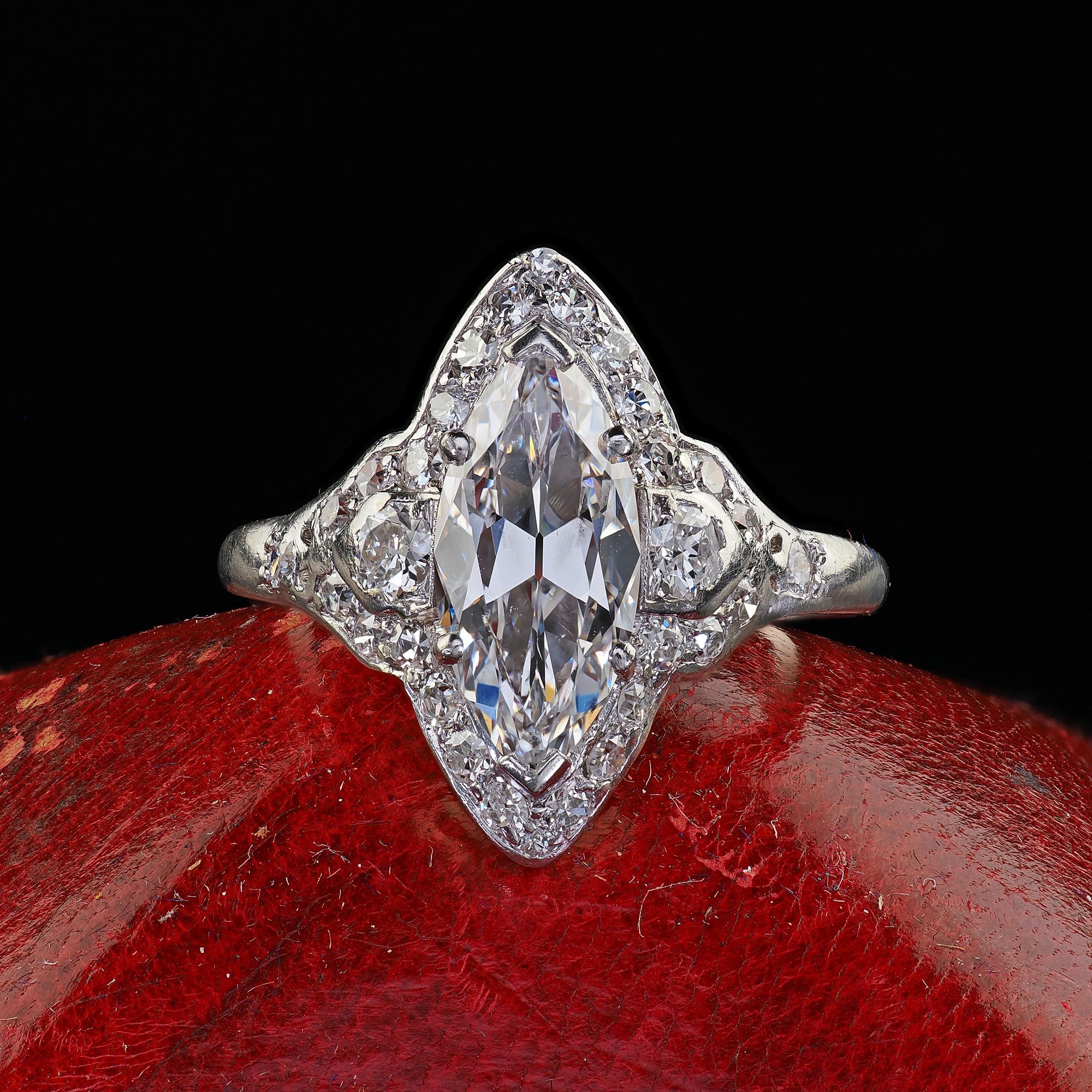 Beautiful Antique Art Deco Platinum Old Cut Marquise Diamond Halo Engagement Ring - GIA. This incredible Art Deco old cut marquise diamond engagement ring is crafted in platinum. This ring features a very rare old cut marquise diamond in the center