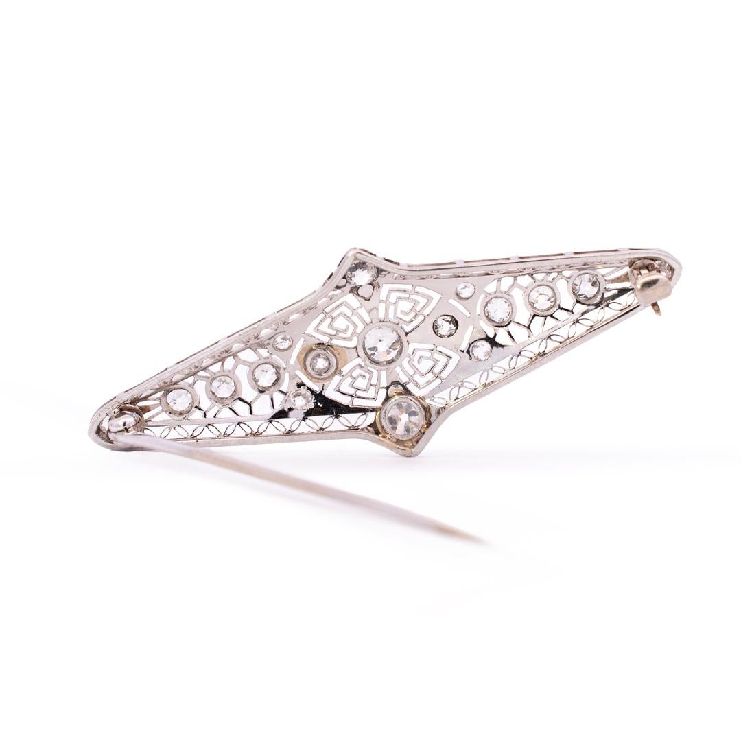 Gender: Ladies

Metal Type: Platinum

Length: 2.00 inches

Width: 17.95mm tapering to 4.20mm

Weight: 4.79 grams

Ladies filigreed vintage 900 platinum diamond brooch.
Pre-owned in Very Good condition. Pin is antique and unpolished, might show minor