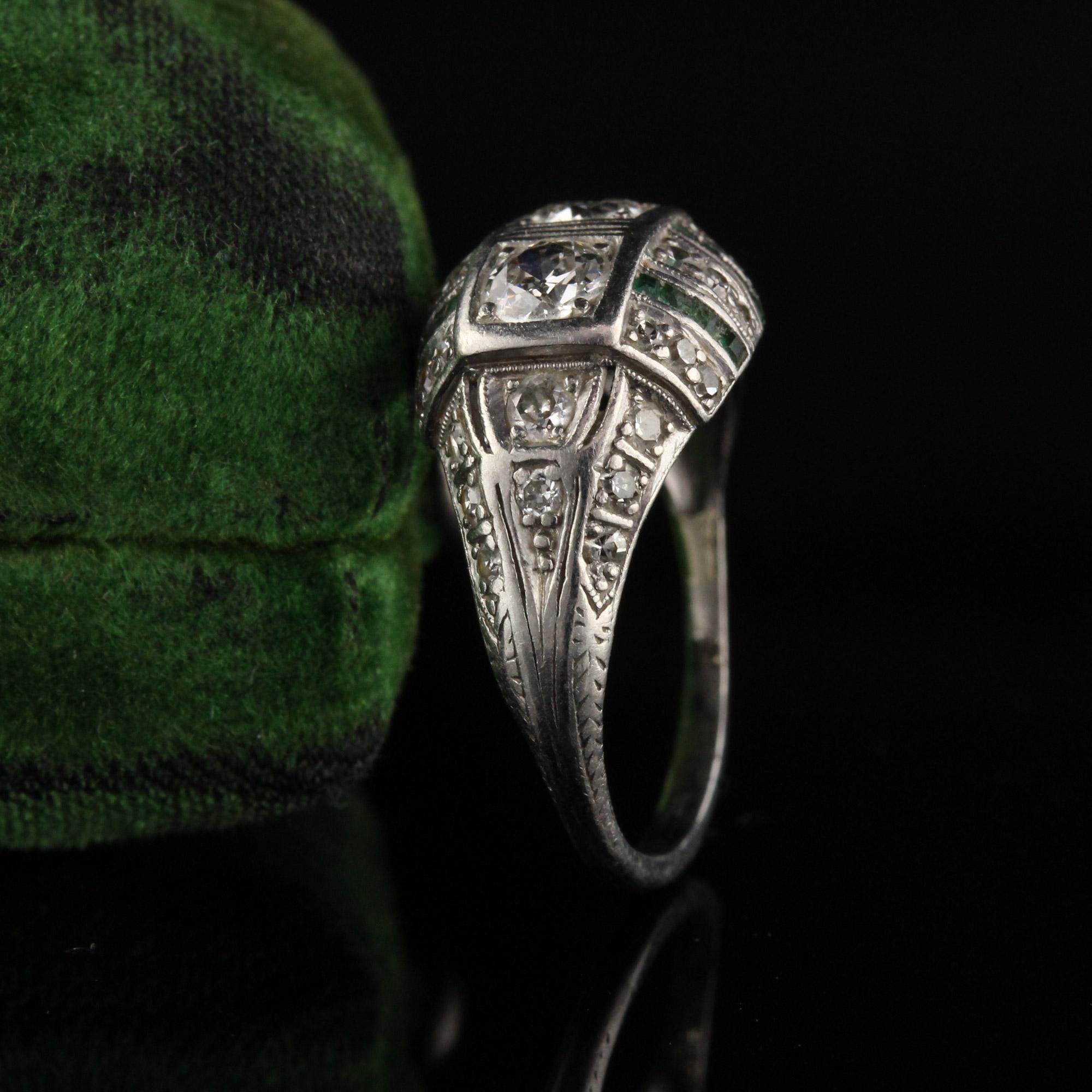 Beautiful Antique Engagement ring with old euro cut diamonds and emeralds. 

Item #R0553

Metal: Platinum

Weight: 3.5 Grams

Total Diamond Weight: Approximately 1.00 cts

Diamond Color: H

Diamond Clarity: SI1

Ring Size: 6

This ring can be sized