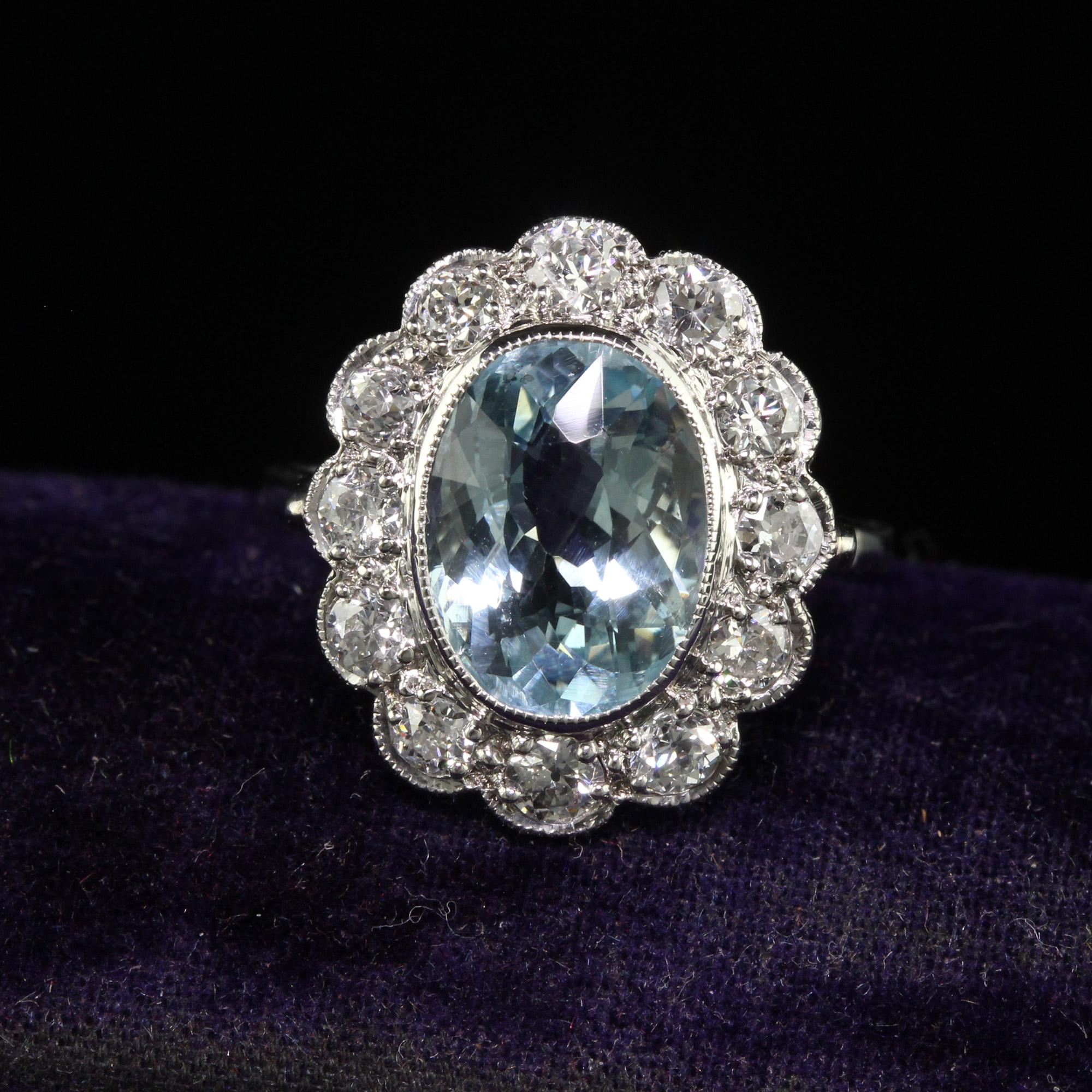 Beautiful Antique Art Deco Platinum Old Euro Diamond and Aquamarine Engagement Ring. This gorgeous art deco aquamarine ring is crafted in platinum. The center holds a beautiful blue aquamarine and is surrounded by old European cut diamonds. The ring