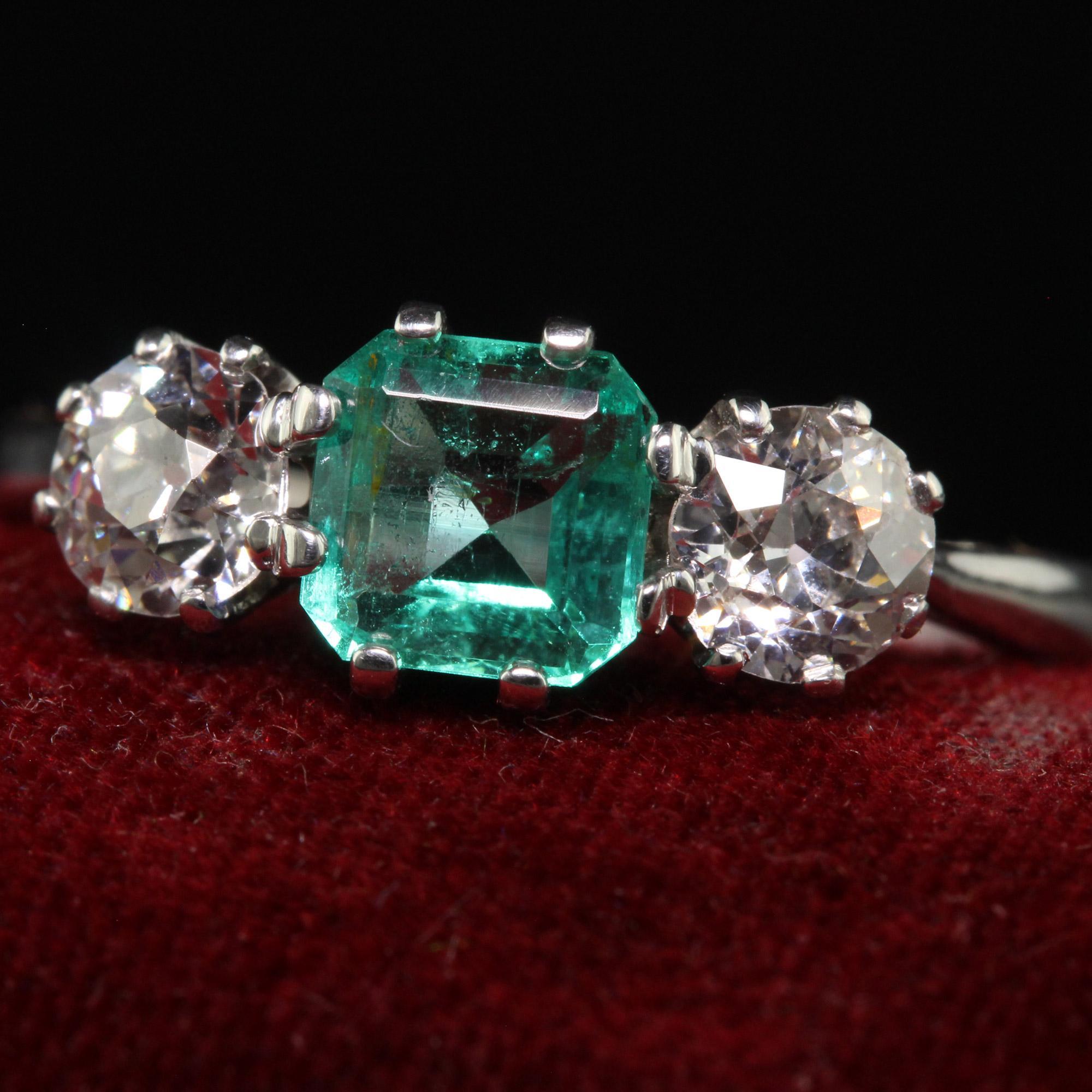 Antique Art Deco Platinum Old Euro Diamond and Emerald Three Stone Ring - GIA In Good Condition For Sale In Great Neck, NY