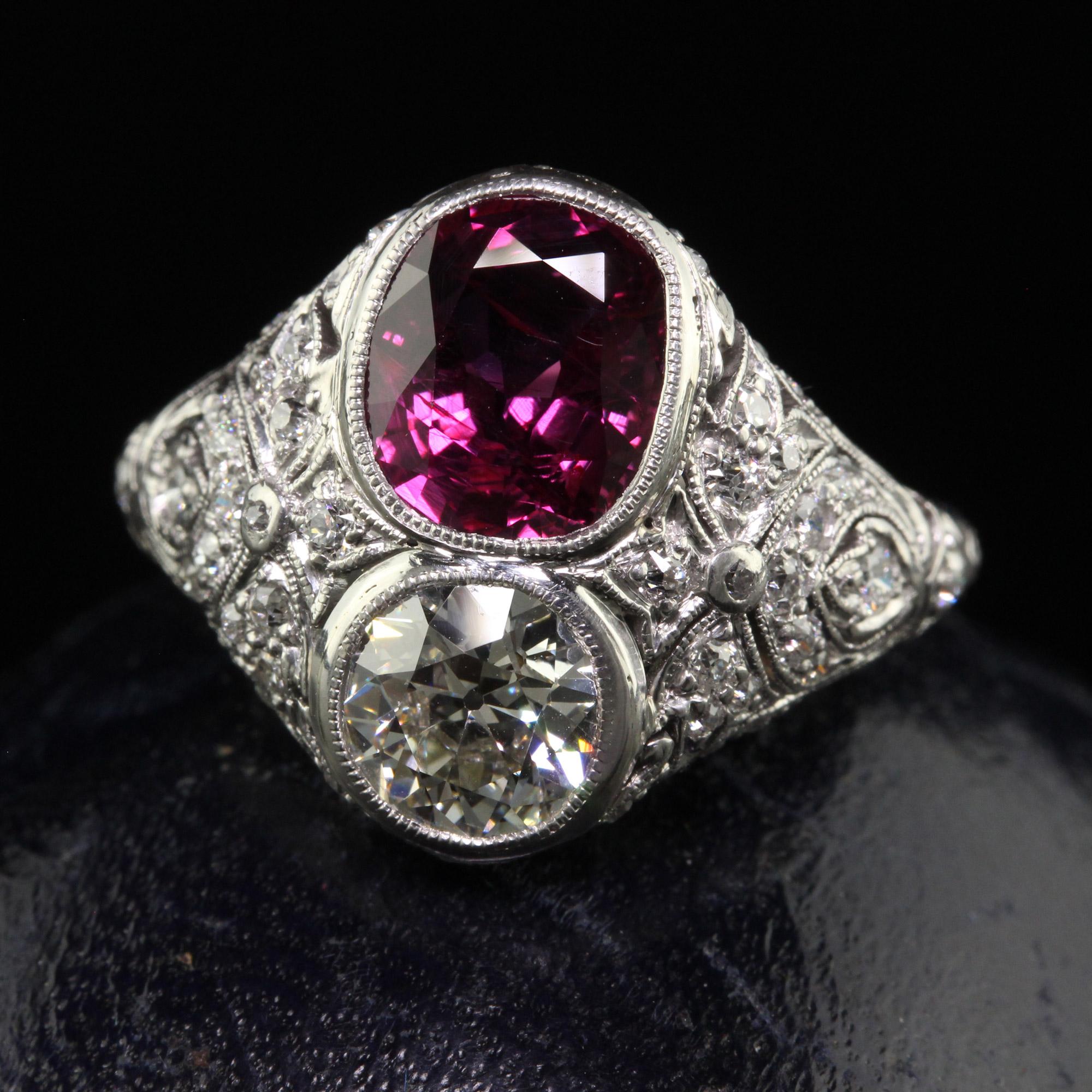 Beautiful Antique Edwardian Platinum Old Euro Diamond and No Heat Ruby Cocktail Ring - GIA. This gorgeous art deco cocktail ring is crafted in platinum. The ring holds a gorgeous natural ruby and diamond that both have GIA reports. There are old cut