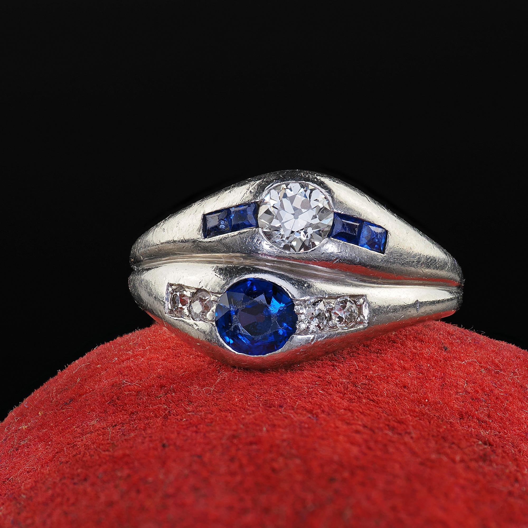 Beautiful Antique Art Deco Platinum Old Euro Diamond and Sapphire Double Ring. This gorgeous Antique Art Deco old European diamond and sapphire ring is crafted in platinum. The ring features old European cut diamonds and sapphires set in a beautiful