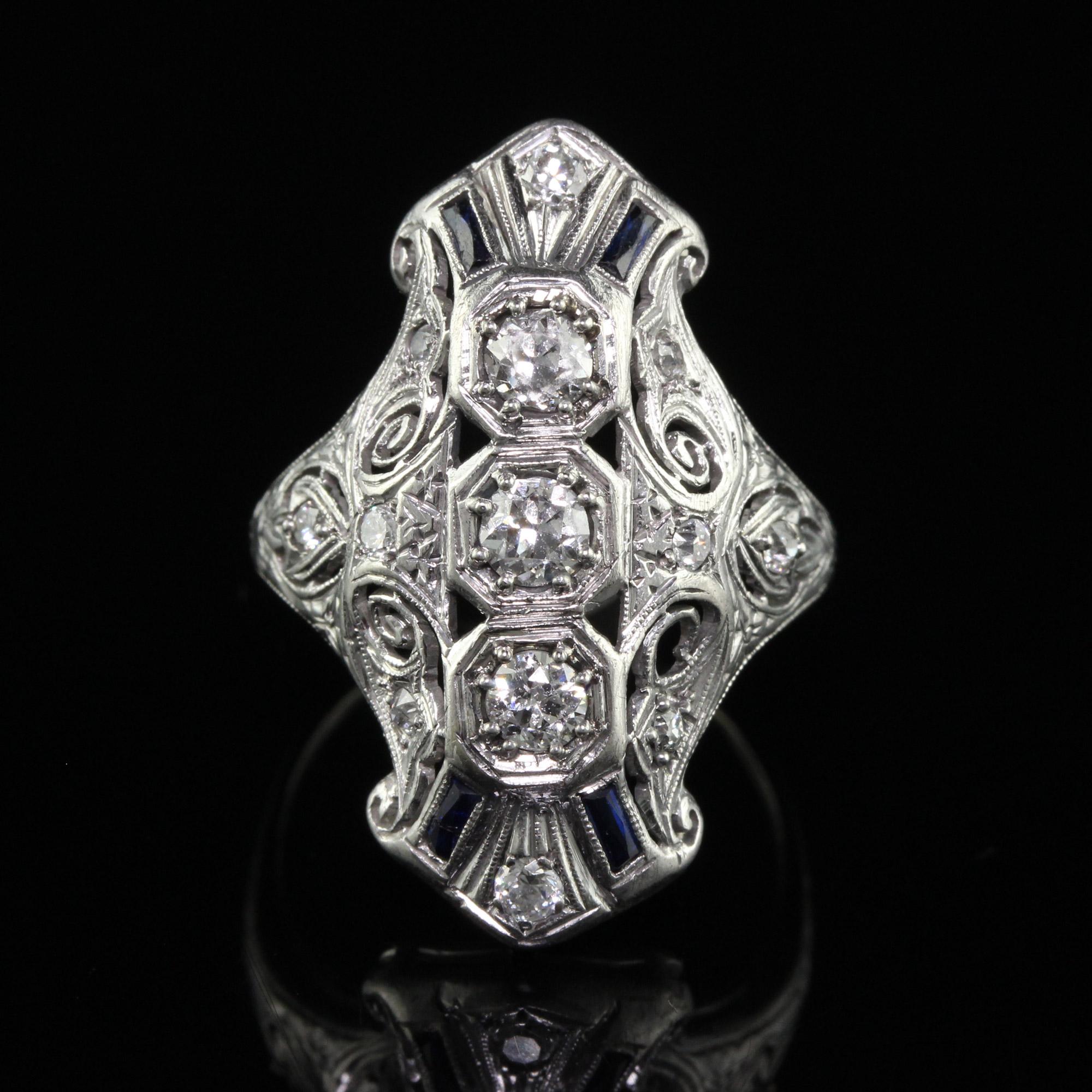 Antique Art Deco Platinum Old Euro Diamond and Sapphire Shield Ring In Good Condition For Sale In Great Neck, NY