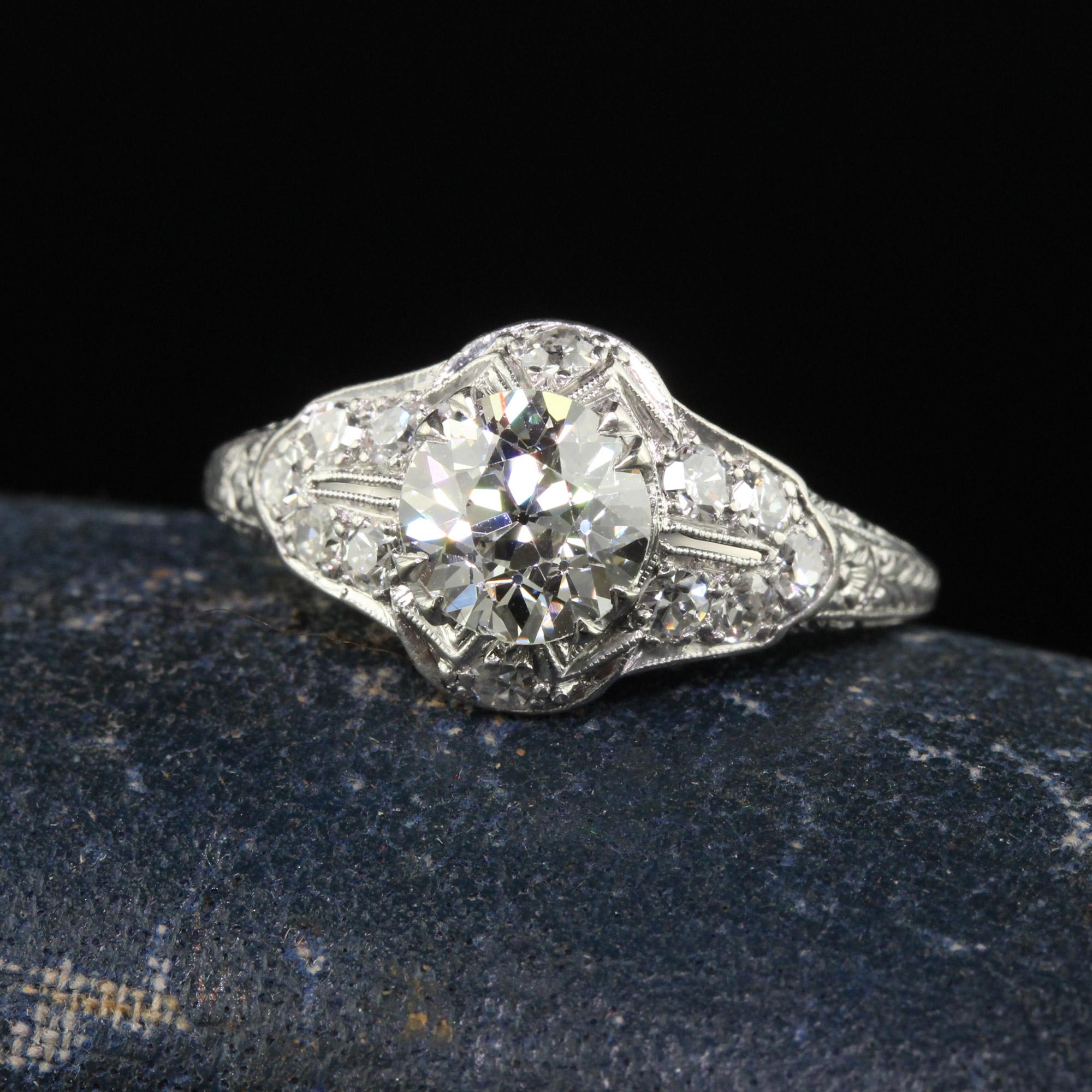 Beautiful Antique Art Deco Platinum Old Euro Diamond Filigree Engagement Ring - GIA. This incredible engagement ring is crafted in platinum. The center holds an old European cut diamond that has a GIA report. It is surrounded by old cut diamonds on