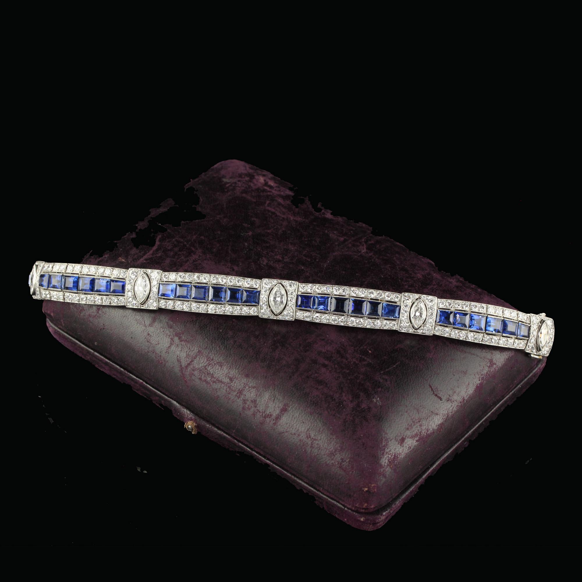 Beautiful Antique Art Deco Platinum Old European Diamond Marquise and Natural Sapphire Bracelet. This amazing Art Deco bracelet is crafted in platinum. There are natural old European cut and Marquise cut diamonds on top of the bracelet with large