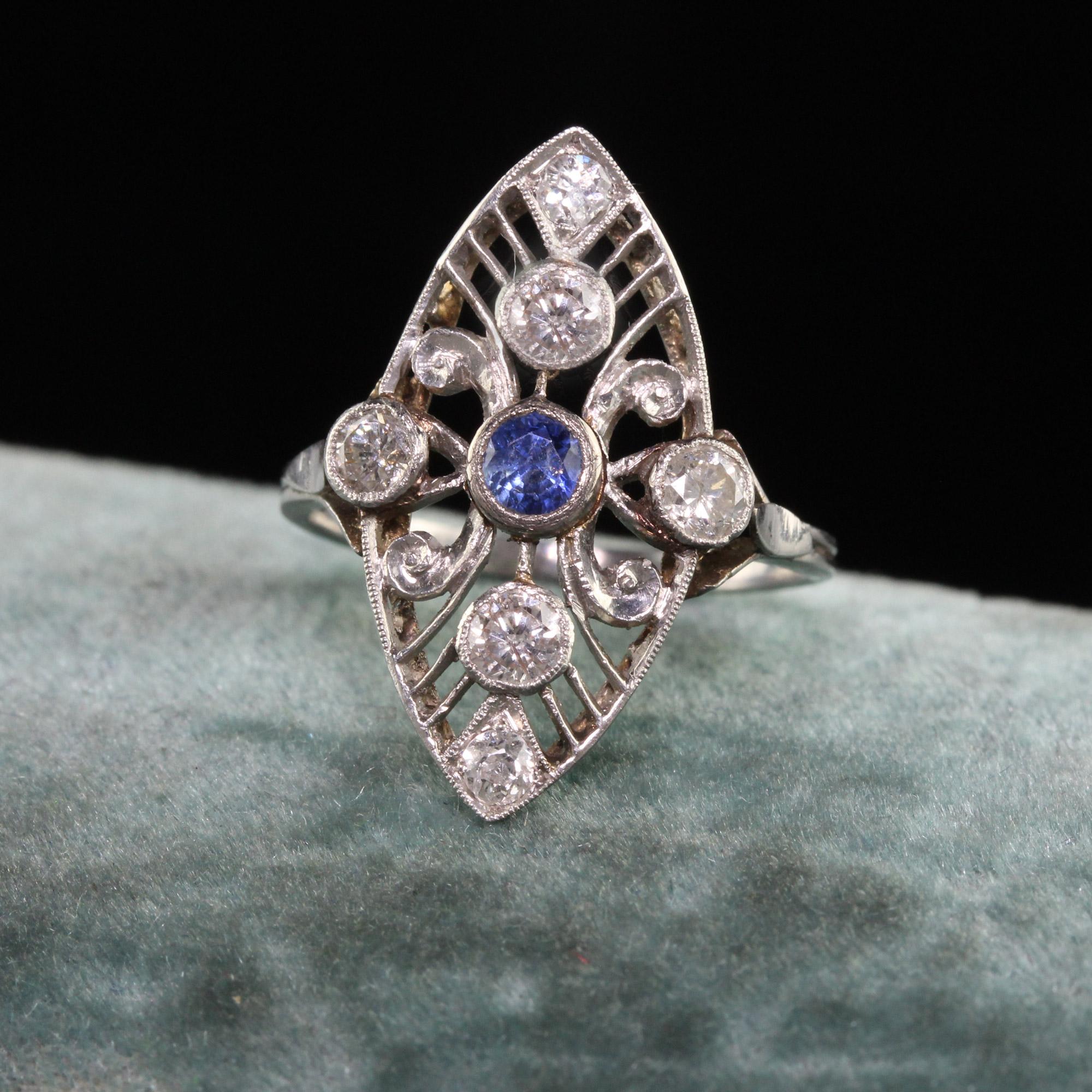 Beautiful Antique Art Deco Platinum Old Euro Diamond Sapphire Navette Ring. This beautiful ring is crafted in platinum. The ring features old european cut diamonds and a natural sapphire in the center of a filigree mounting.

Item #R1360

Metal: