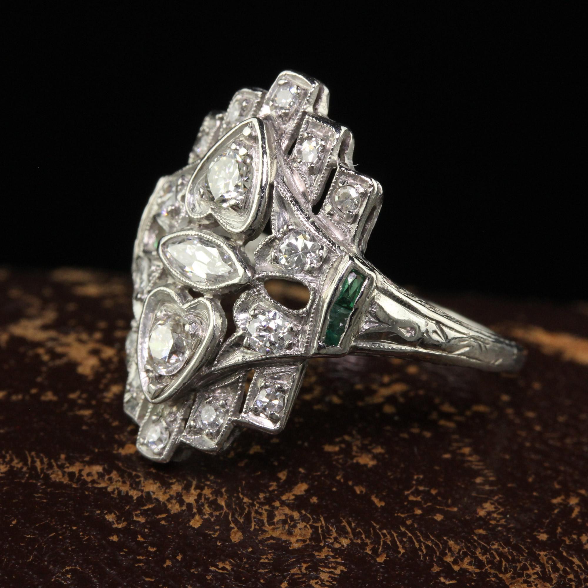 Antique Art Deco Platinum Old Euro Marquise Diamond and Emerald Shield Ring In Good Condition For Sale In Great Neck, NY