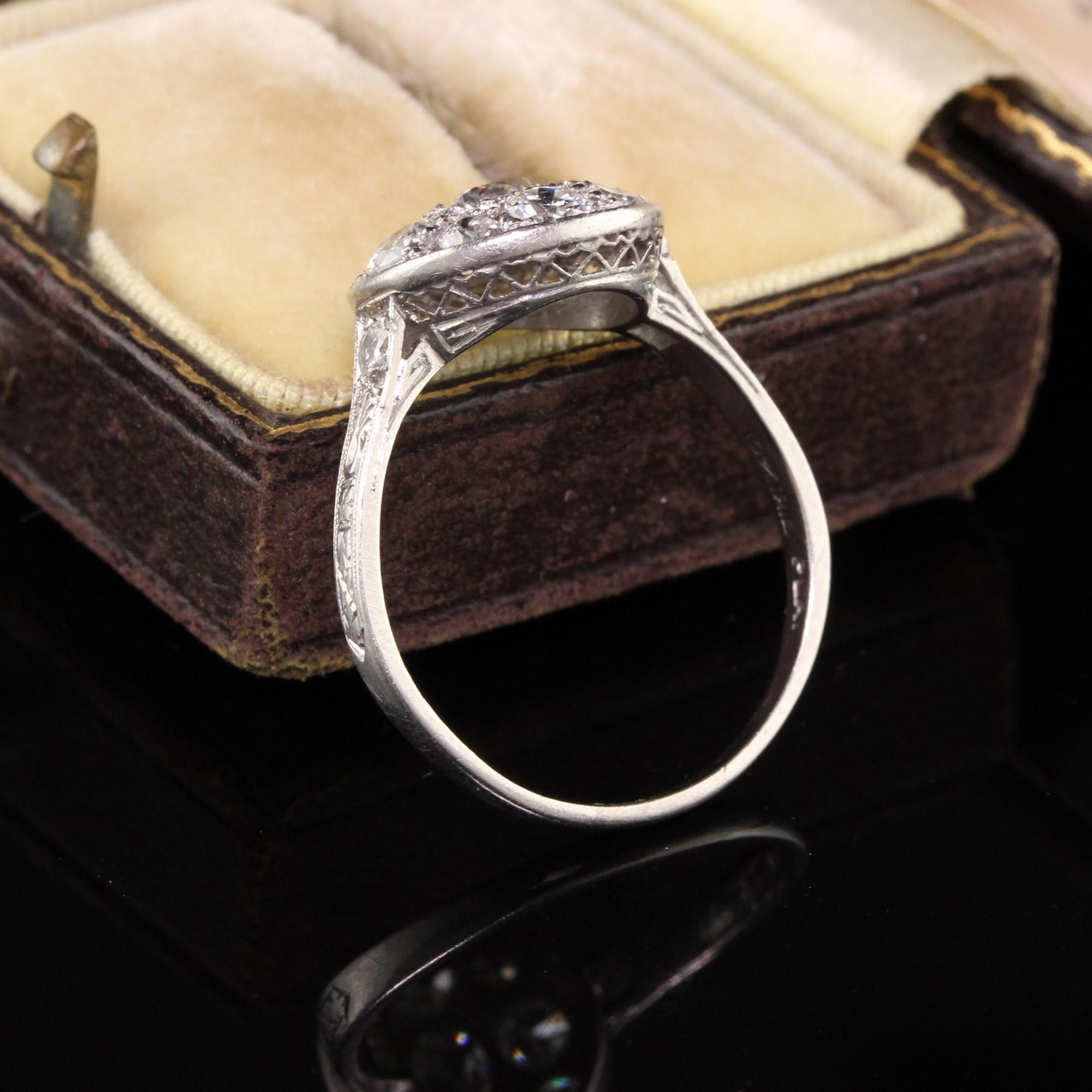 Beautiful Antique Art Deco Platinum Old European Cut Diamond Cluster Engagement Ring. This gorgeous ring has old european cut diamonds set in a pristine filigree mounting with incredible craftsmanship.

Item #R0763

Metal: Platinum

Diamond: