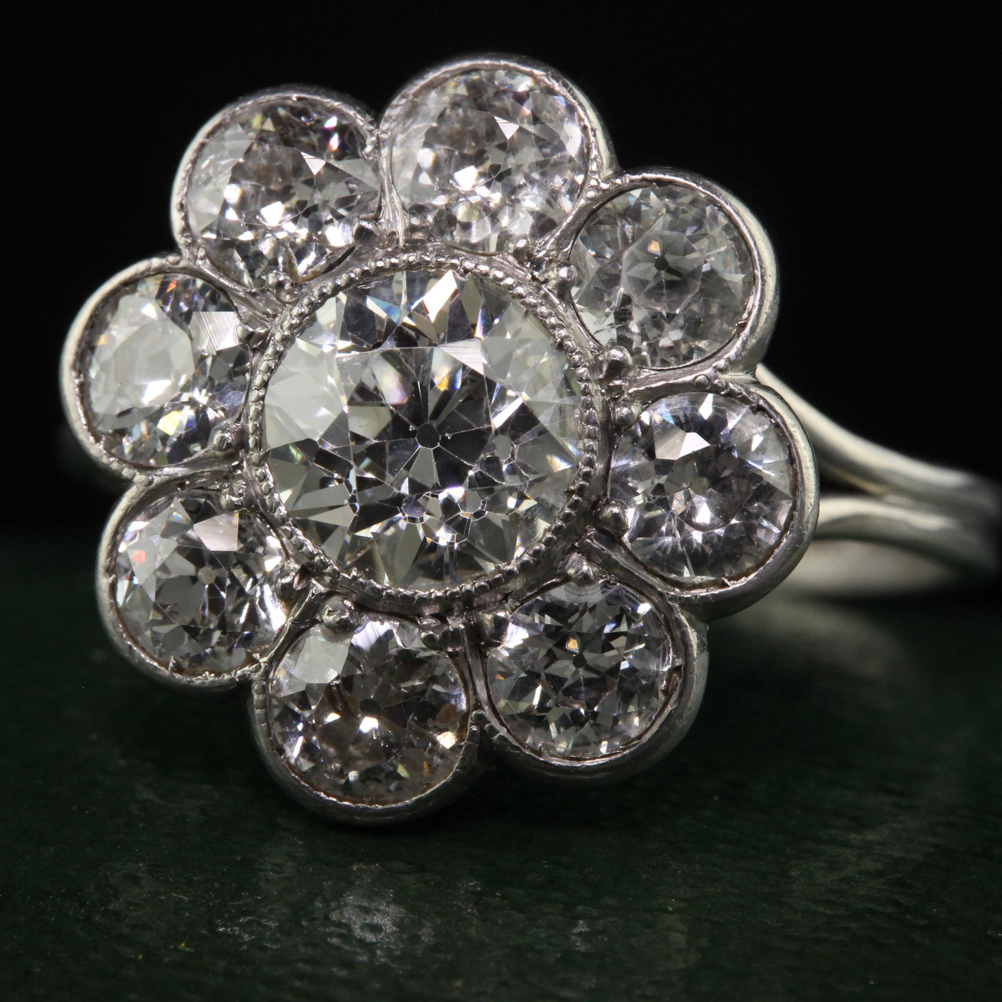 Antique Art Deco Platinum Old European Cut Diamond Cluster Engagement Ring For Sale 1