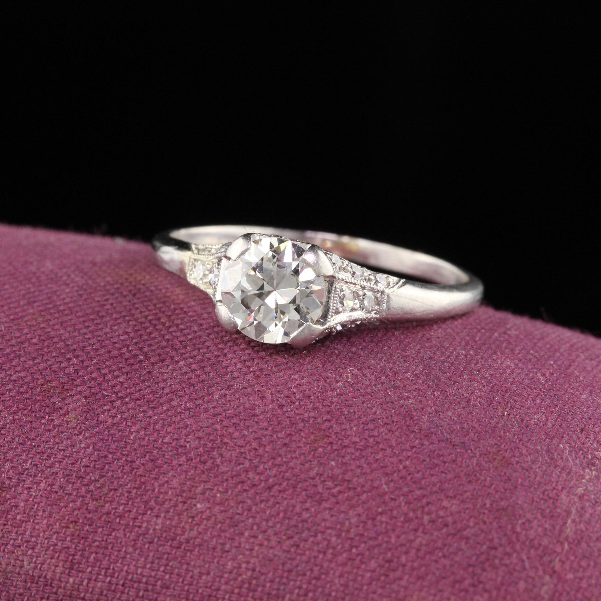 Simple & classic art deco engagement ring in platinum featuring an old european cut diamond in the center with 2 single cut diamonds on either side and on the gallery.

#R0402

Metal: Platinum

Weight: 2.7 Grams

Center Diamond Weight: Approximately