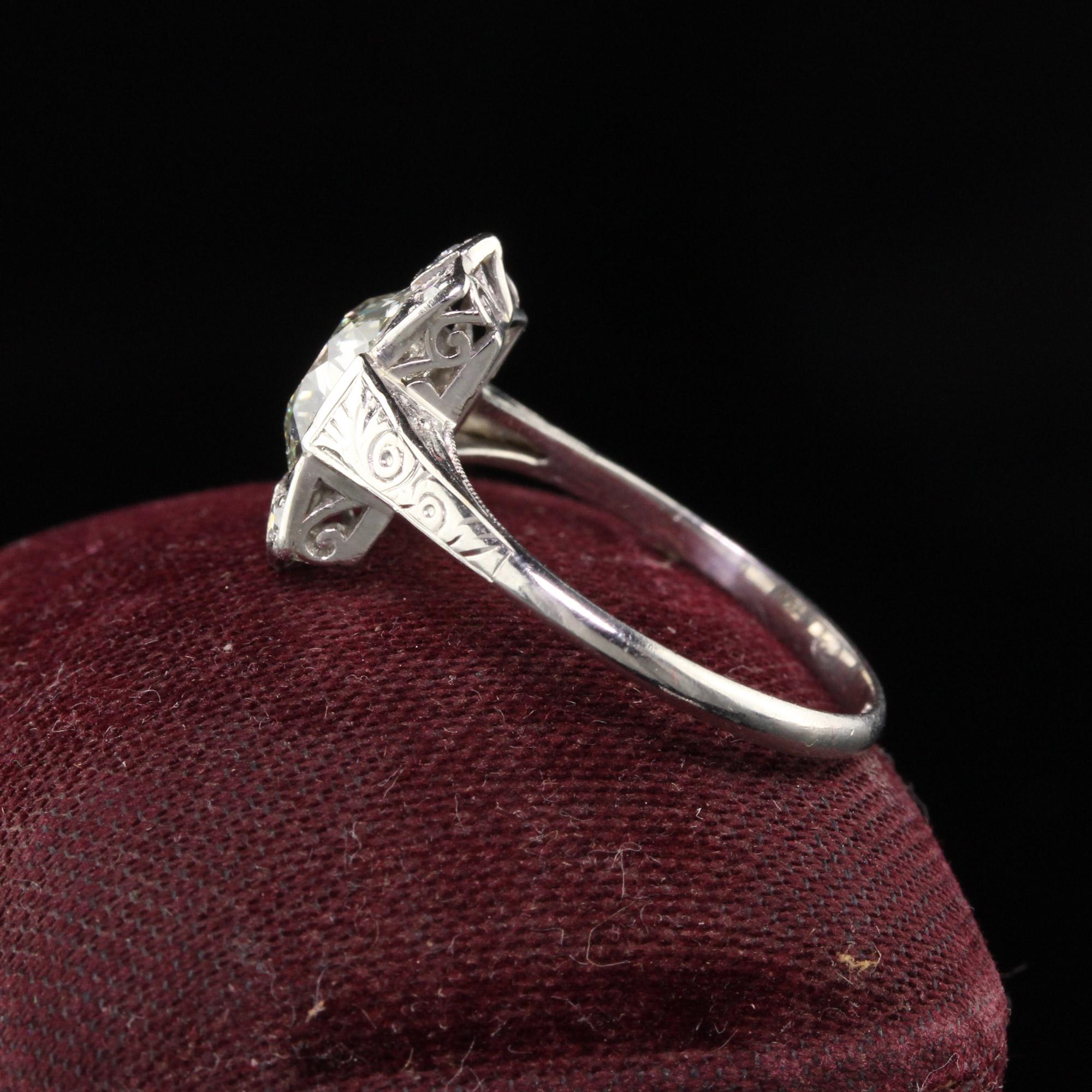 An incredible Antique Art Deco Platinum Old European Cut Diamond Engagement Ring. It features a 1.30 ct old european cut diamond in the center on an amazing art deco mounting. The center diamond looks like it is floating on your
