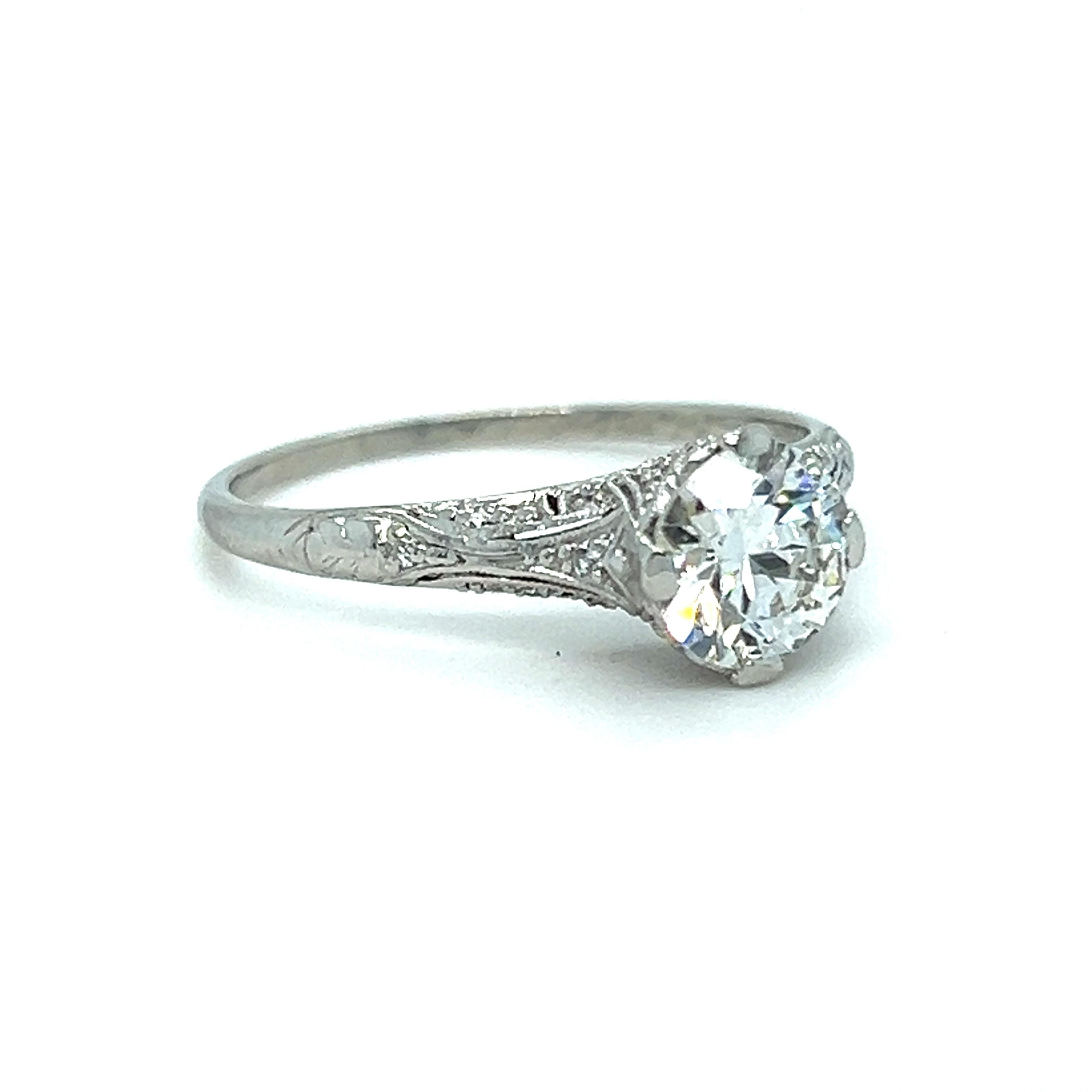 Classic Traditional Art Deco Vintage Platinum Old European Cut Diamond Engagement Ring The style of the ring is timeless, and the craftsmanship excellent. Crafted in solid Platinum, the ring features a lovely prong center, with gorgeous open work