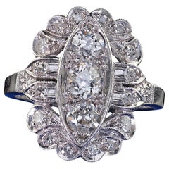 Bague bouclier filigrane Art déco ancienne en platine avec diamant taille vieille Europe