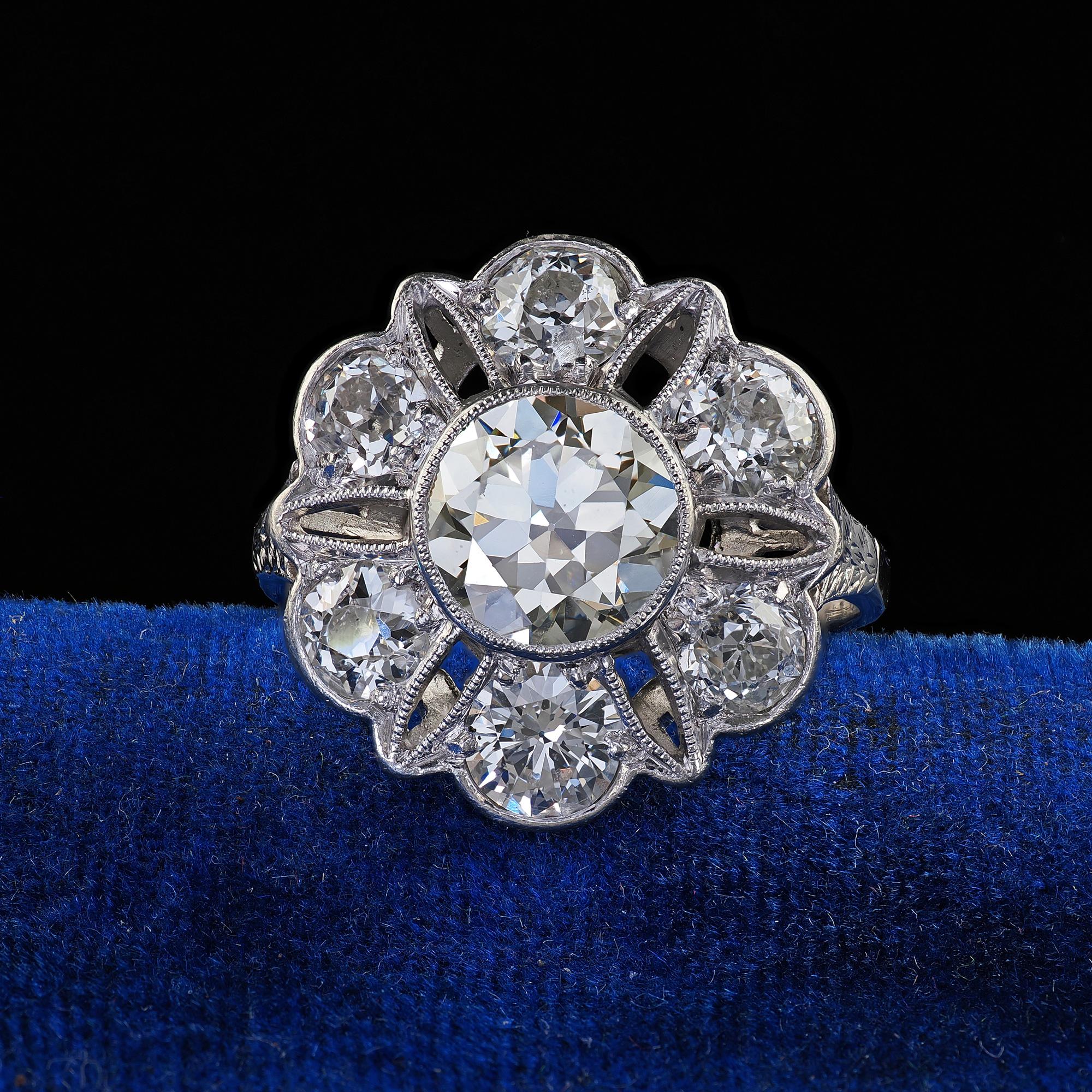 Beautiful Antique Art Deco Platinum Old European Cut Diamond Floral Engagement Ring - GIA. This beautiful Art Deco old European floral engagement ring is crafted in platinum. The ring features a gorgeous old European cut diamond in the center that