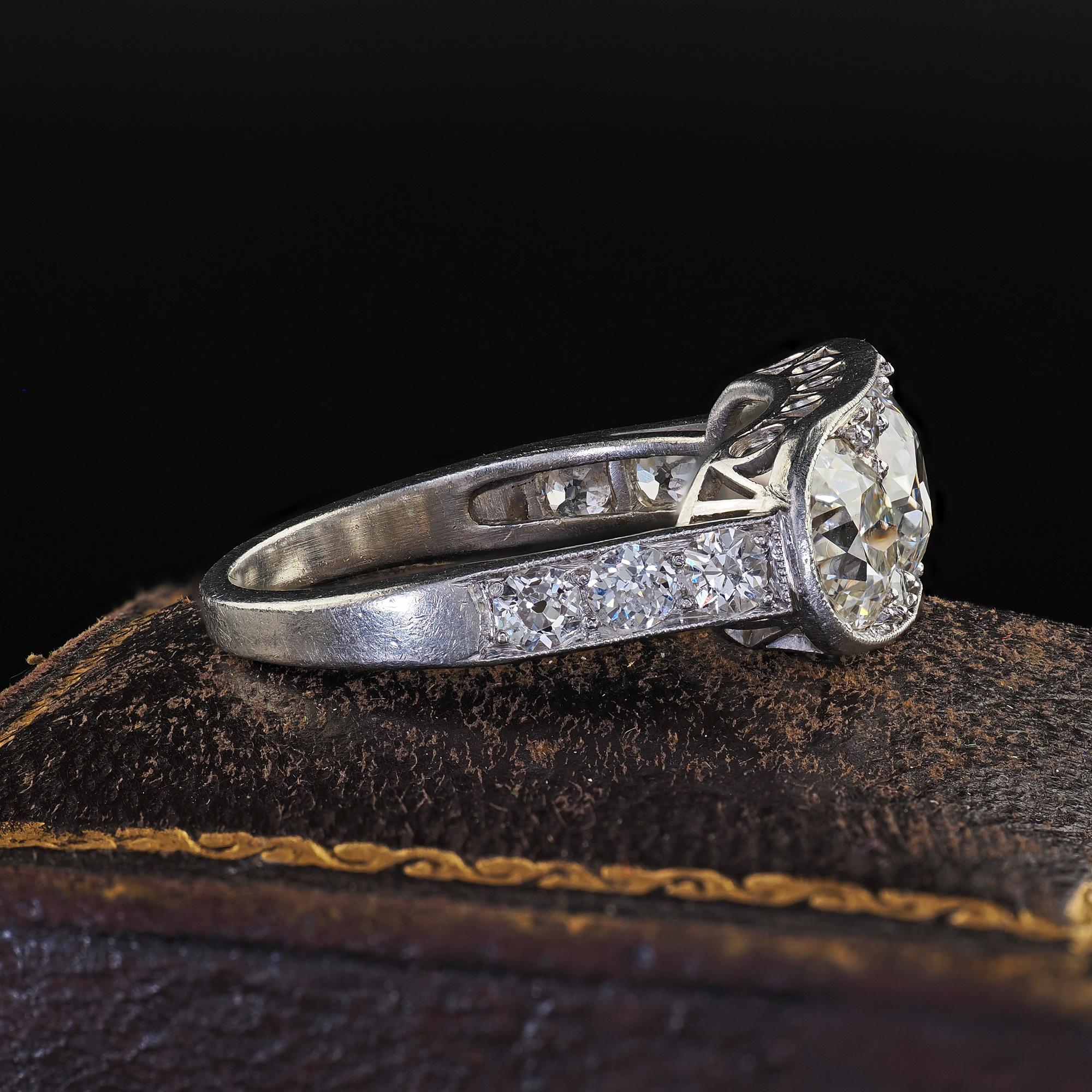 Women's Antique Art Deco Platinum Old European Cut Diamond Three Stone Diamond Ring For Sale