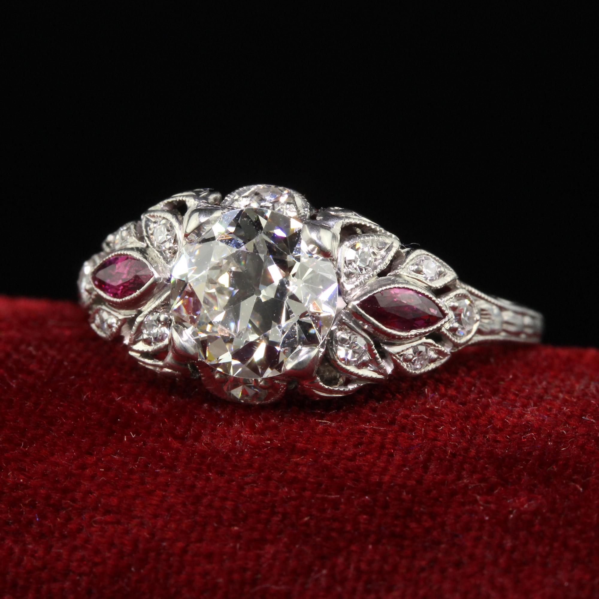 Beautiful Antique Art Deco Platinum Old European Diamond and Ruby Engagement Ring - GIA. This incredible engagement ring is crafted in platinum. The center holds an old cut diamond that has a GIA report. The diamond is set in one of the most