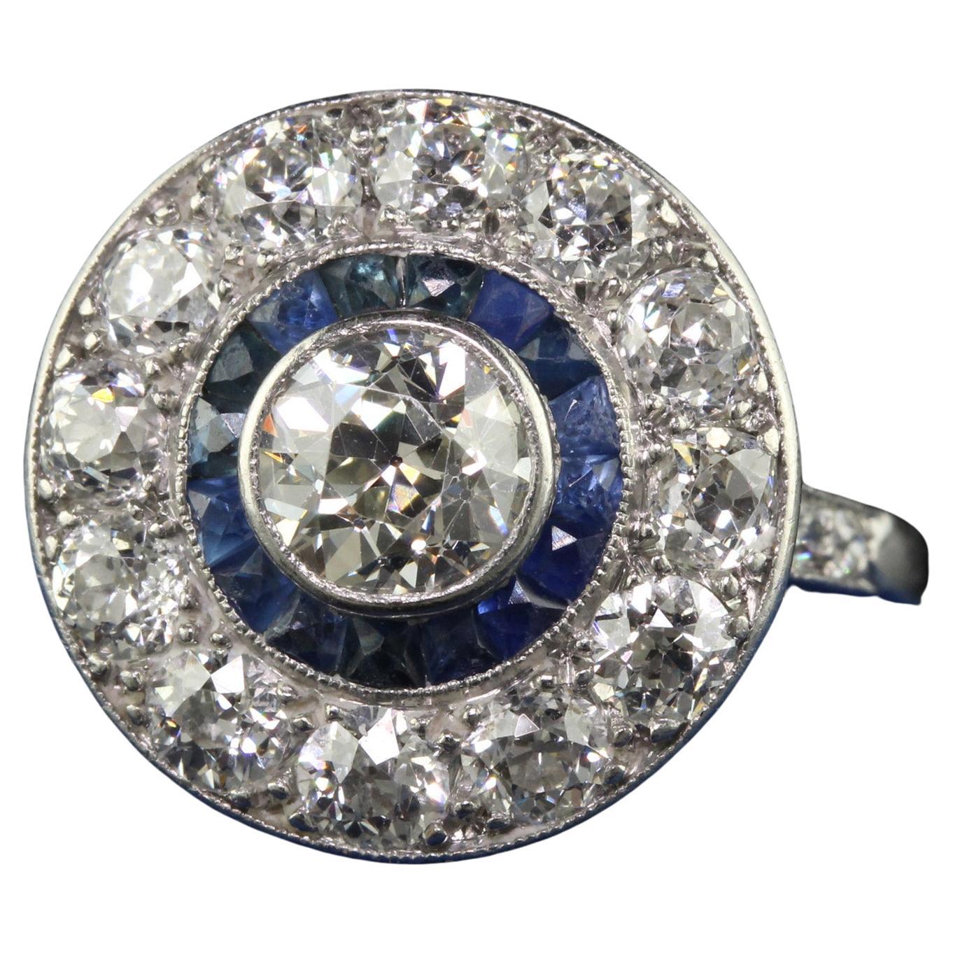 Antique Art Deco Platinum Old European Diamond and Sapphire Target Engagement Ri For Sale