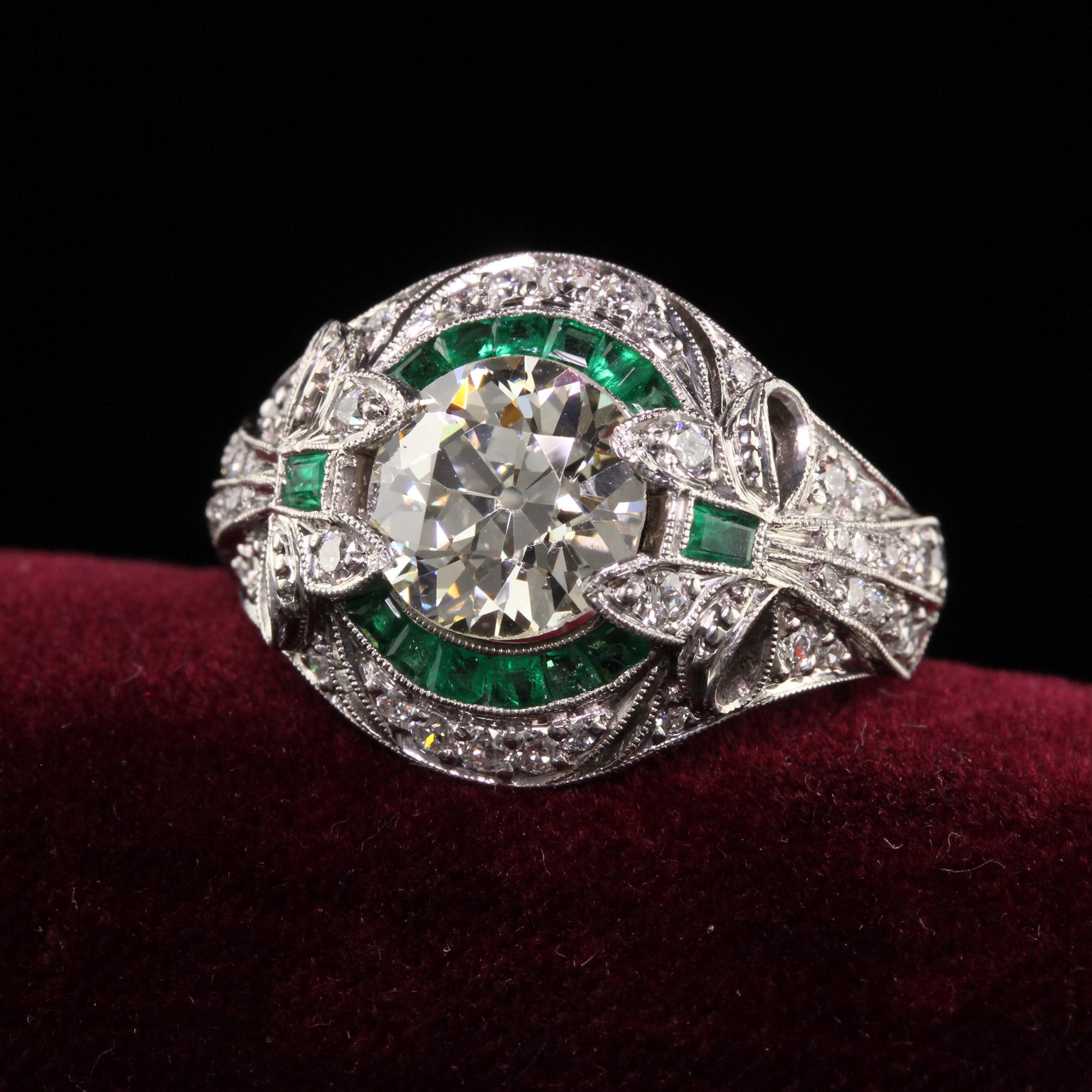 Beautiful Antique Art Deco Platinum Old European Diamond Emerald Engagement Ring - GIA. This incredible engagement ring is crafted in platinum. The center holds a beautiful old european cut diamond that is GIA certified. It is set in an art deco