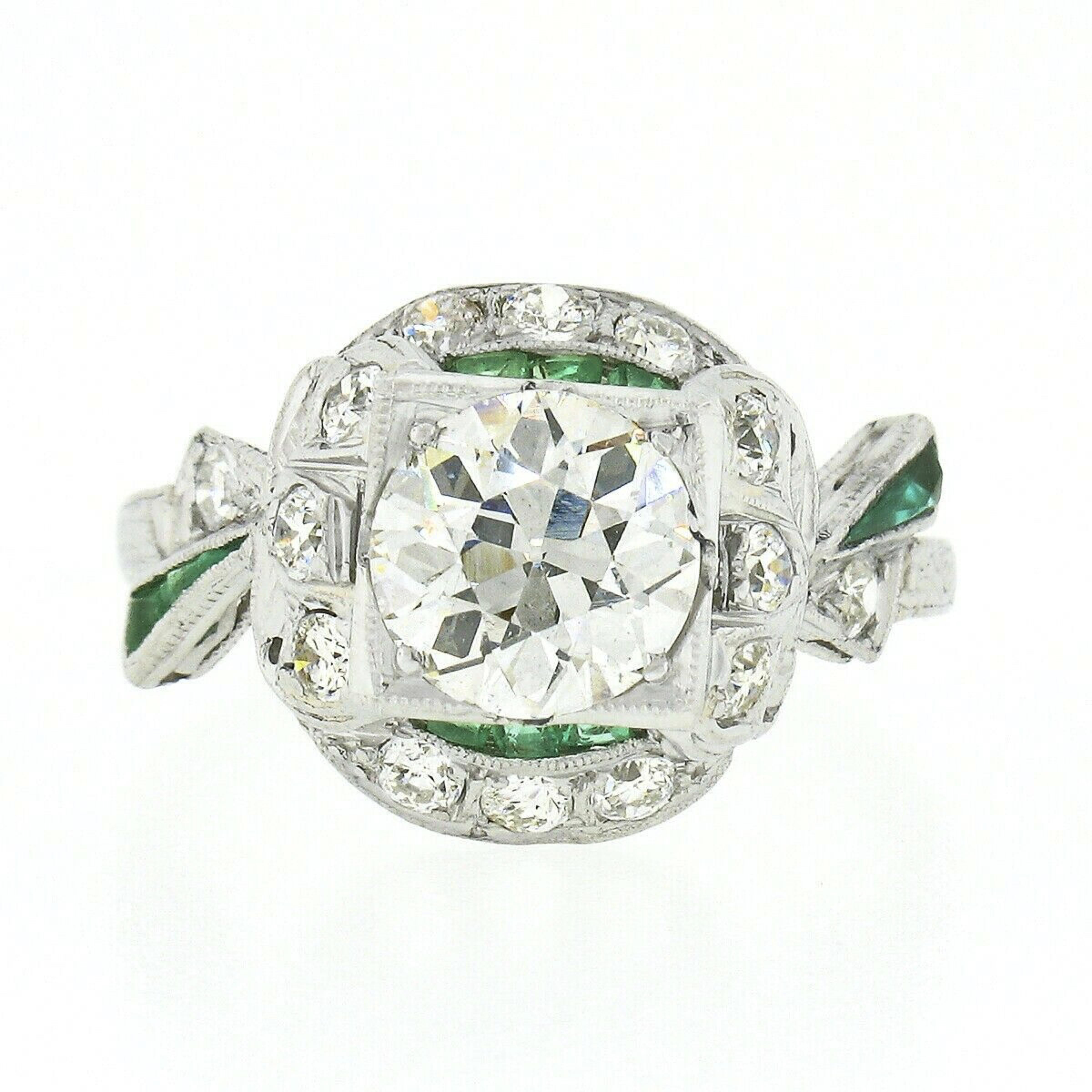 Antique Art Deco Platinum Old European Diamond & Emerald Ribbon Engagement Ring In Good Condition For Sale In Montclair, NJ