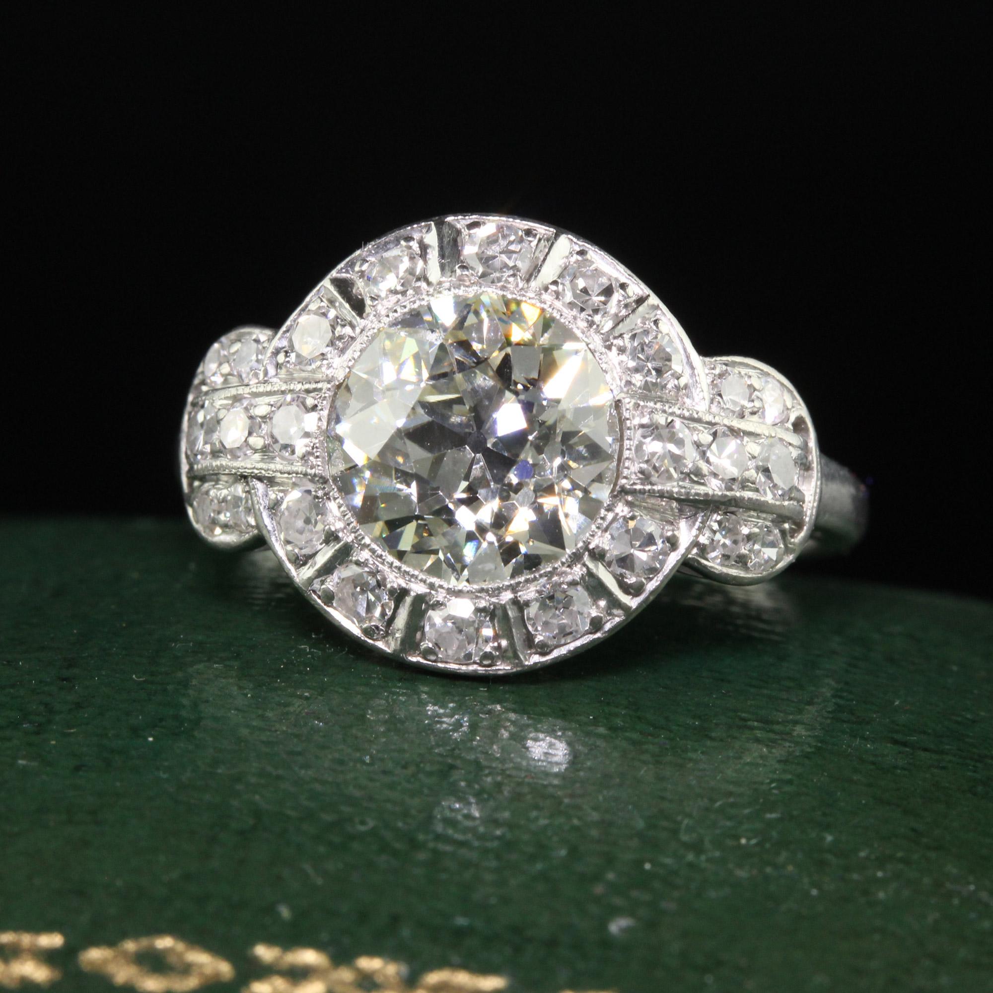 Beautiful Antique Art Deco Platinum Old European Diamond Engagement Ring - GIA. This incredible engagement ring is crafted in platinum. The center holds an old european cut diamond that has a GIA report. The center diamond is surrounded by old