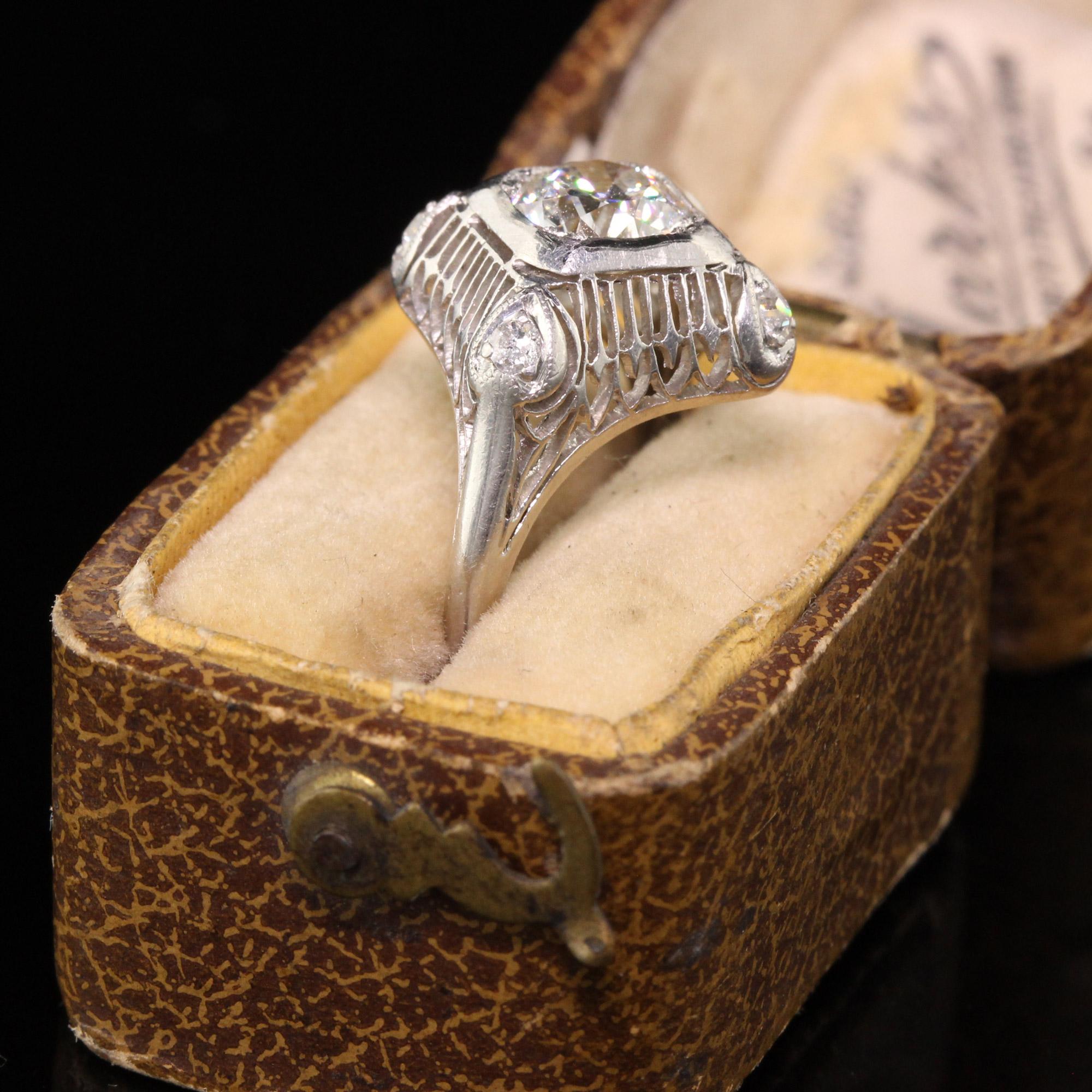 A gorgeous Antique Art Deco Platinum Old European Diamond Filigree Engagement Ring that features a beautiful old european cut diamond in a gorgeous filigree mounting with hearts.

Item #R0582

Metal: Platinum

Weight: 2.8 Grams

Diamonds: