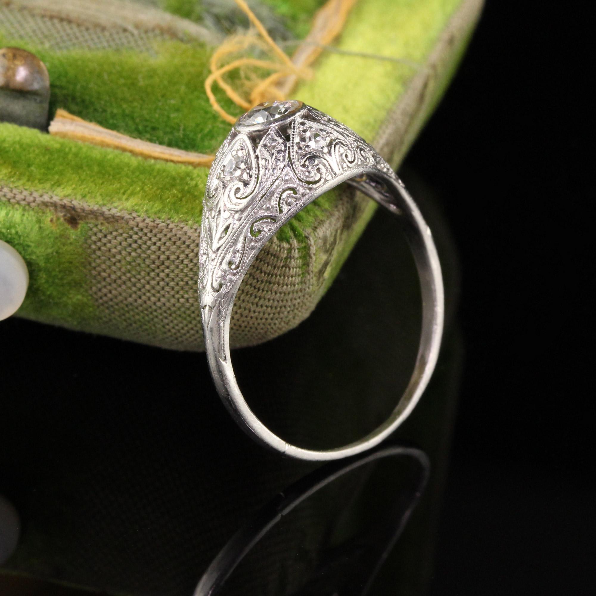 Beautiful Antique Art Deco Platinum Old European Diamond Filigree Engagement Ring. This beautiful ring has fine filigree and milgrain work all over the ring.

Item #R0767

Metal: Platinum

Diamond: Approximately .50 ct

Color: H

Clarity:
