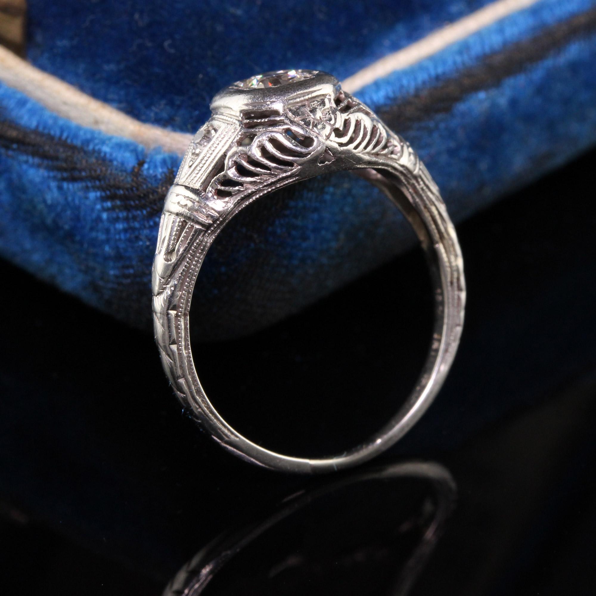 Beautiful Antique Art Deco Platinum Old European Diamond Filigree Engagement Ring. This beautiful engagement ring has a bright white old european diamond set in a beautiful art deco platinum filigree mounting.

Item #R0809

Metal: Platinum

Diamond: