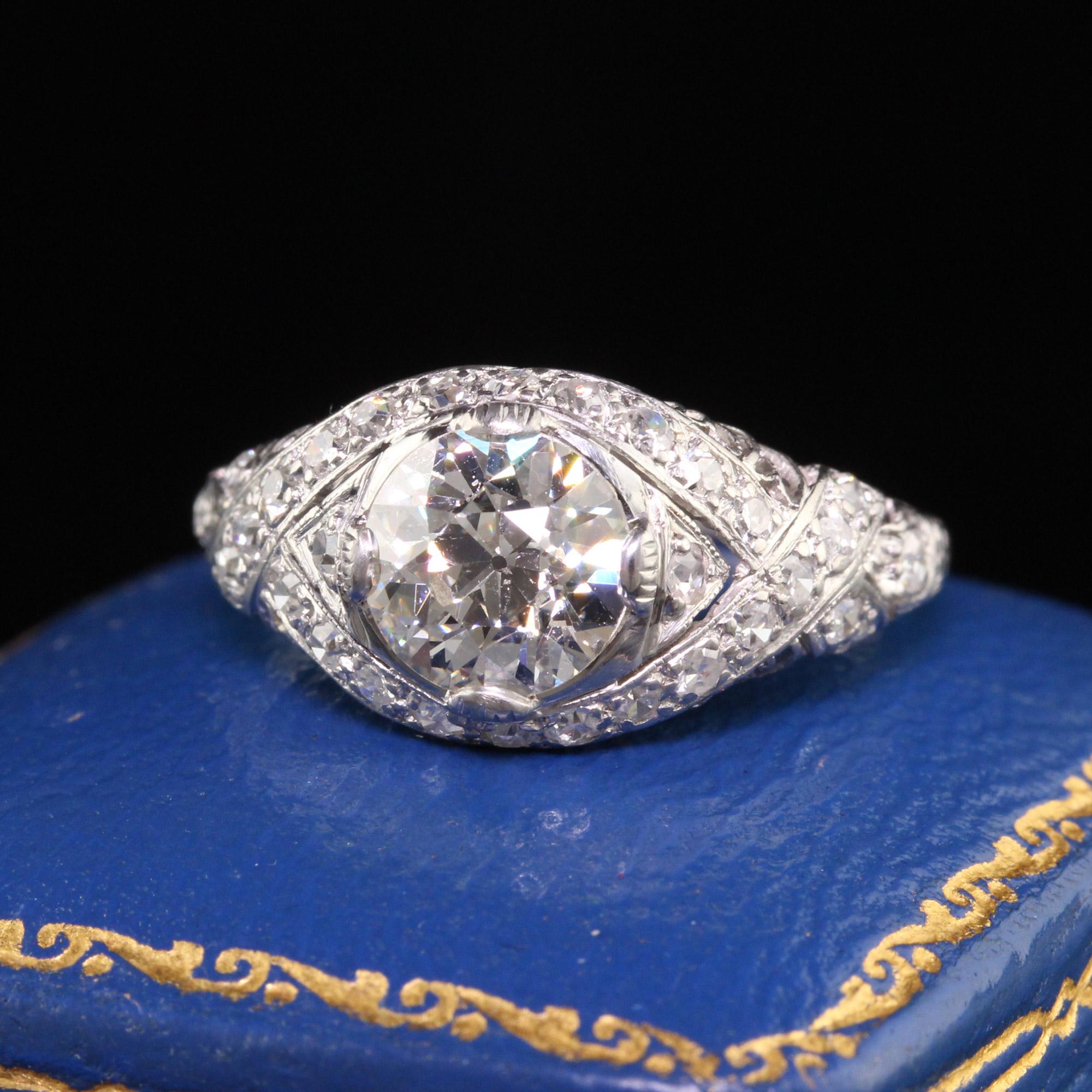 Beautiful Antique Art Deco Platinum Old European Diamond Filigree Engagement Ring. This incredible engagement ring is crafted in platinum. The center holds and old european cut diamond with single cut diamonds set in this intricate mounting. The