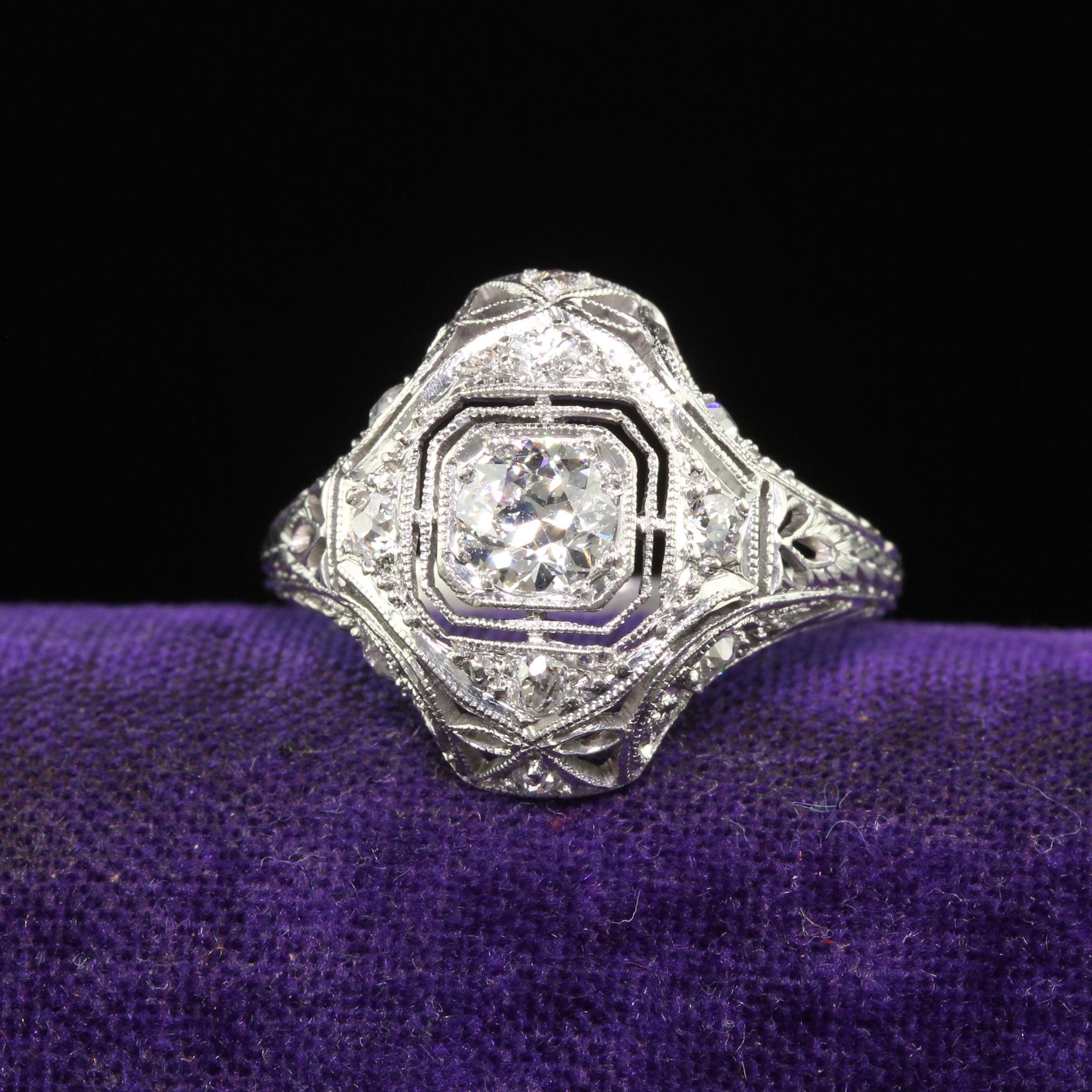 Beautiful Antique Art Deco Platinum Old European Diamond Filigree Engagement Ring. This incredible Art Deco engagement ring is crafted in platinum. This ring features a beautiful old European cut diamond set in the center of an incredible Art Deco
