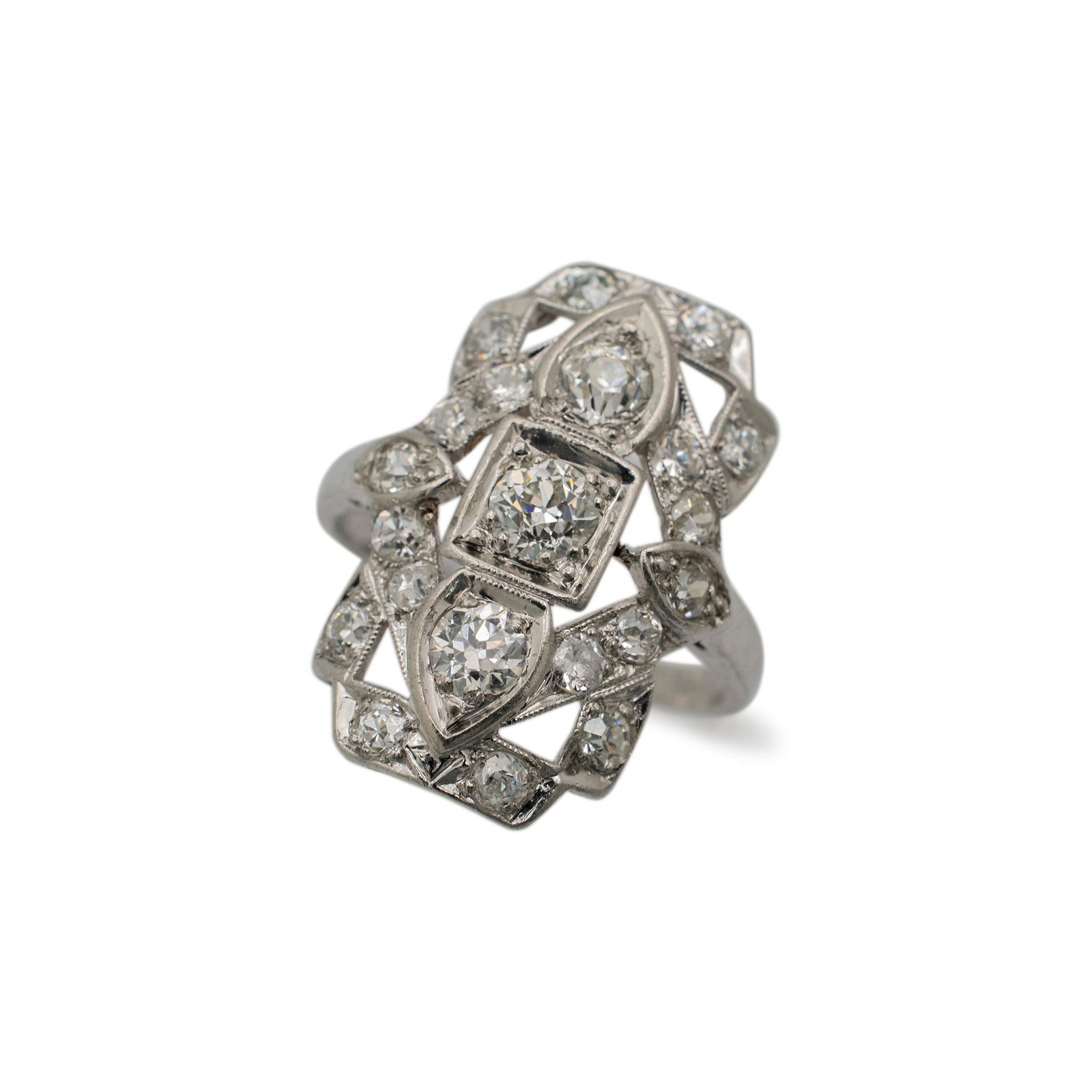 Gender: Ladies

Metal Type: Platinum

Ring Size: 4.5

Weight: 4.36 grams

Shank Maximum Width: 2.00mm

Ladies handmade filigreed platinum, diamond art-deco (1920-1930) cocktail ring with a half-round shank.

The metal was tested and determined to be